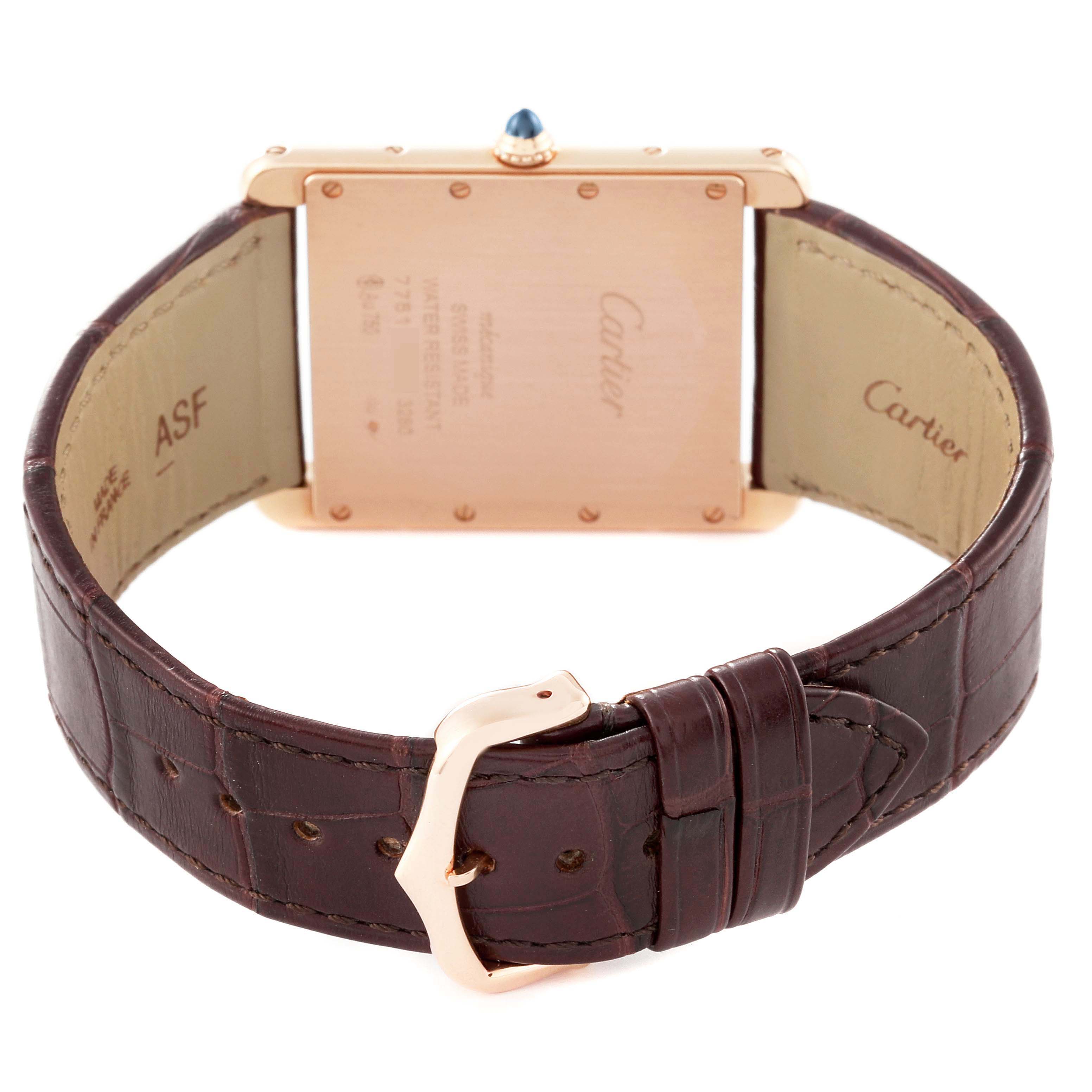 The image shows the back of a Cartier Tank Louis W1560017 Men's Rose Gold Silver Dial W1560017 Men's Rose Gold Silver Dial watch, including its case back, brown leather strap, and buckle.