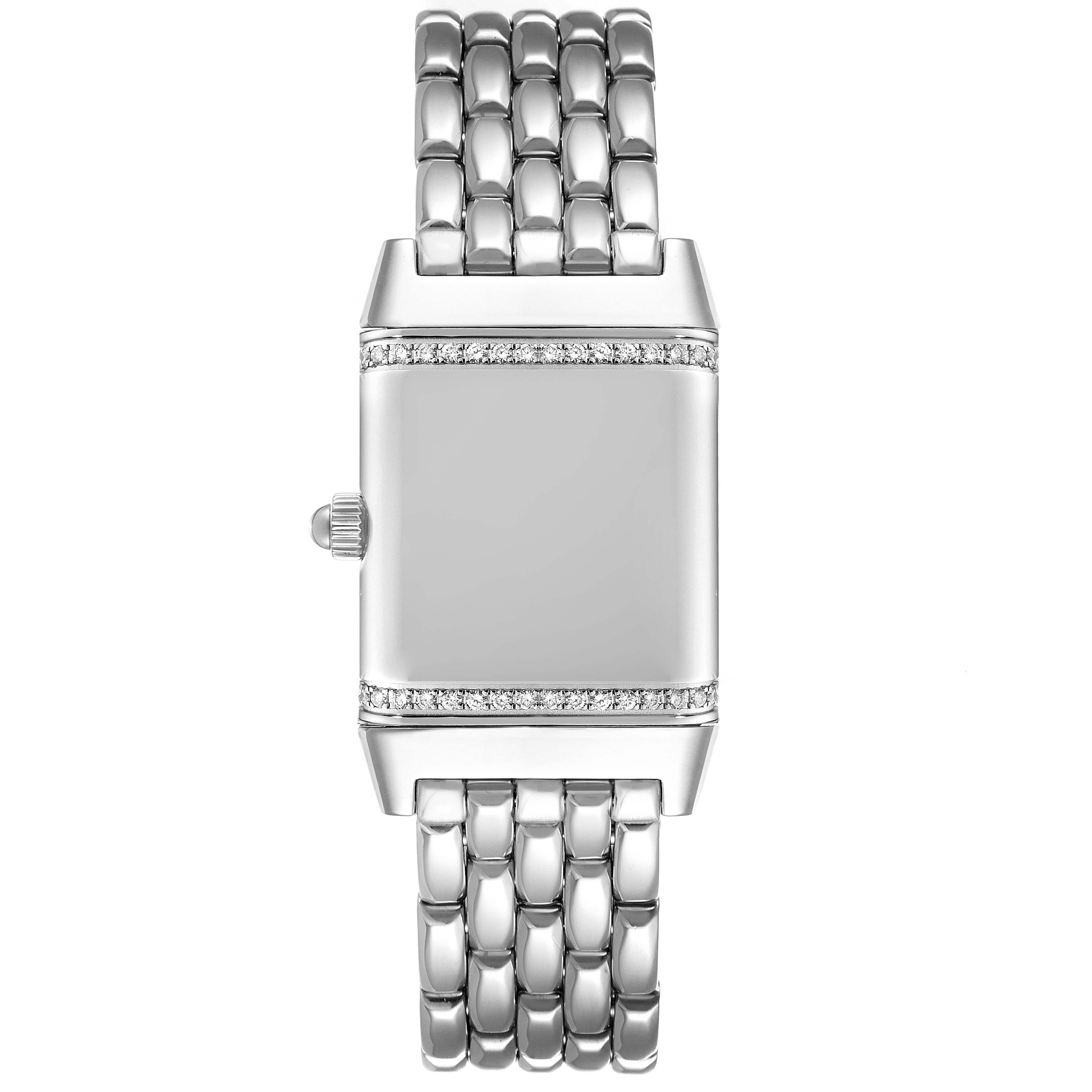 The image shows a Jaeger-LeCoultre Reverso watch, viewed from the front, highlighting its case, crown, and bracelet.
