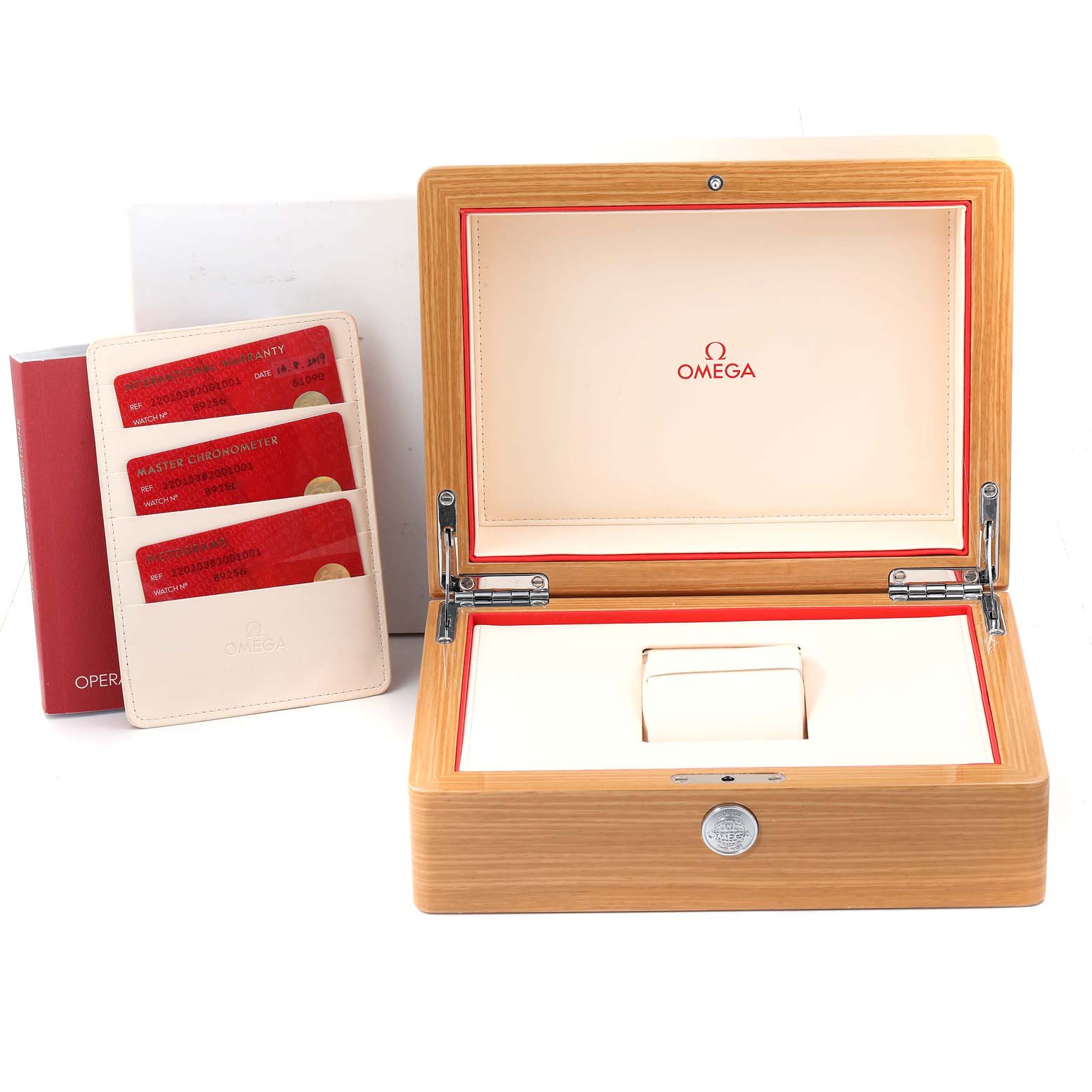 The image shows an Omega Aqua Terra 220.10.38.20.01.001 Men's Stainless Steel Black Dial 220.10.38.20.01.001 Men's Stainless Steel Black Dial watch box, warranty cards, and an operating manual from a top-down angle.