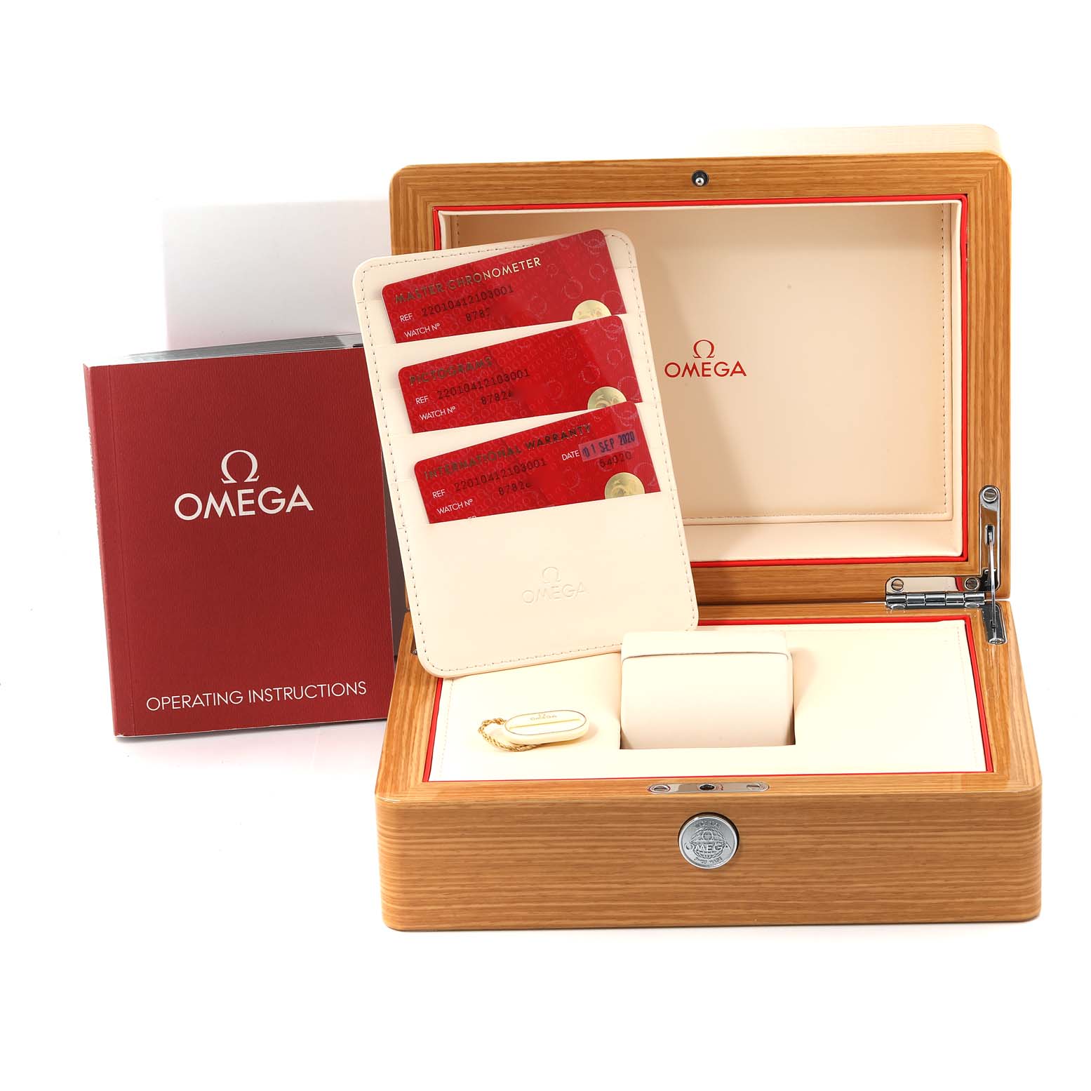 The image shows the Omega Aqua Terra 220.10.41.21.03.001 Men
s Stainless Steel Blue Dial 220.10.41.21.03.001 Men
s Stainless Steel Blue Dial watch accessories, including the watch box, operating instructions, and warranty cards.