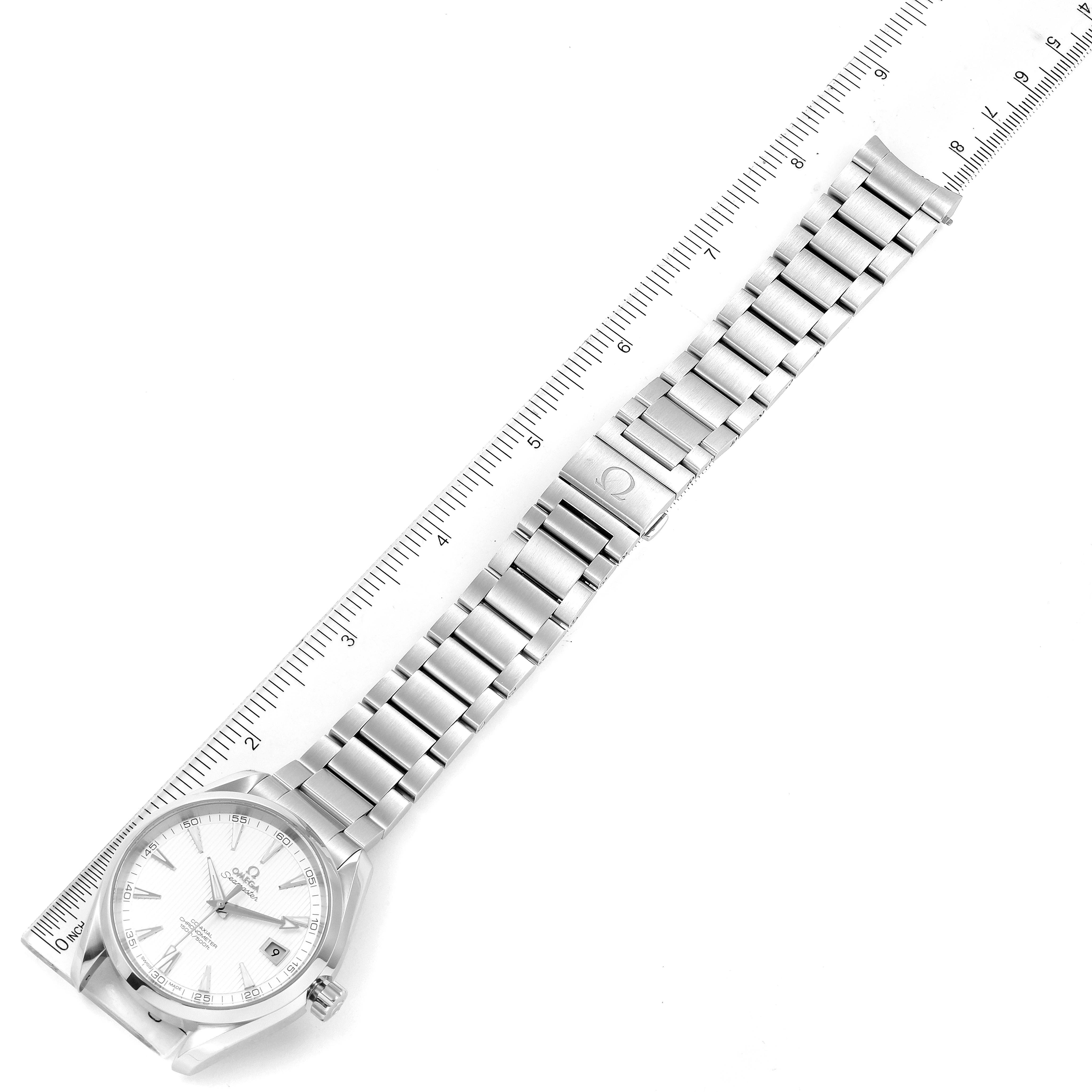 The image shows an Omega Aqua Terra 231.10.42.21.02.001 Men
s Stainless Steel Silver Dial 231.10.42.21.02.001 Men
s Stainless Steel Silver Dial watch, viewed from above, showcasing the dial, bracelet, and clasp along with a ruler for scale.