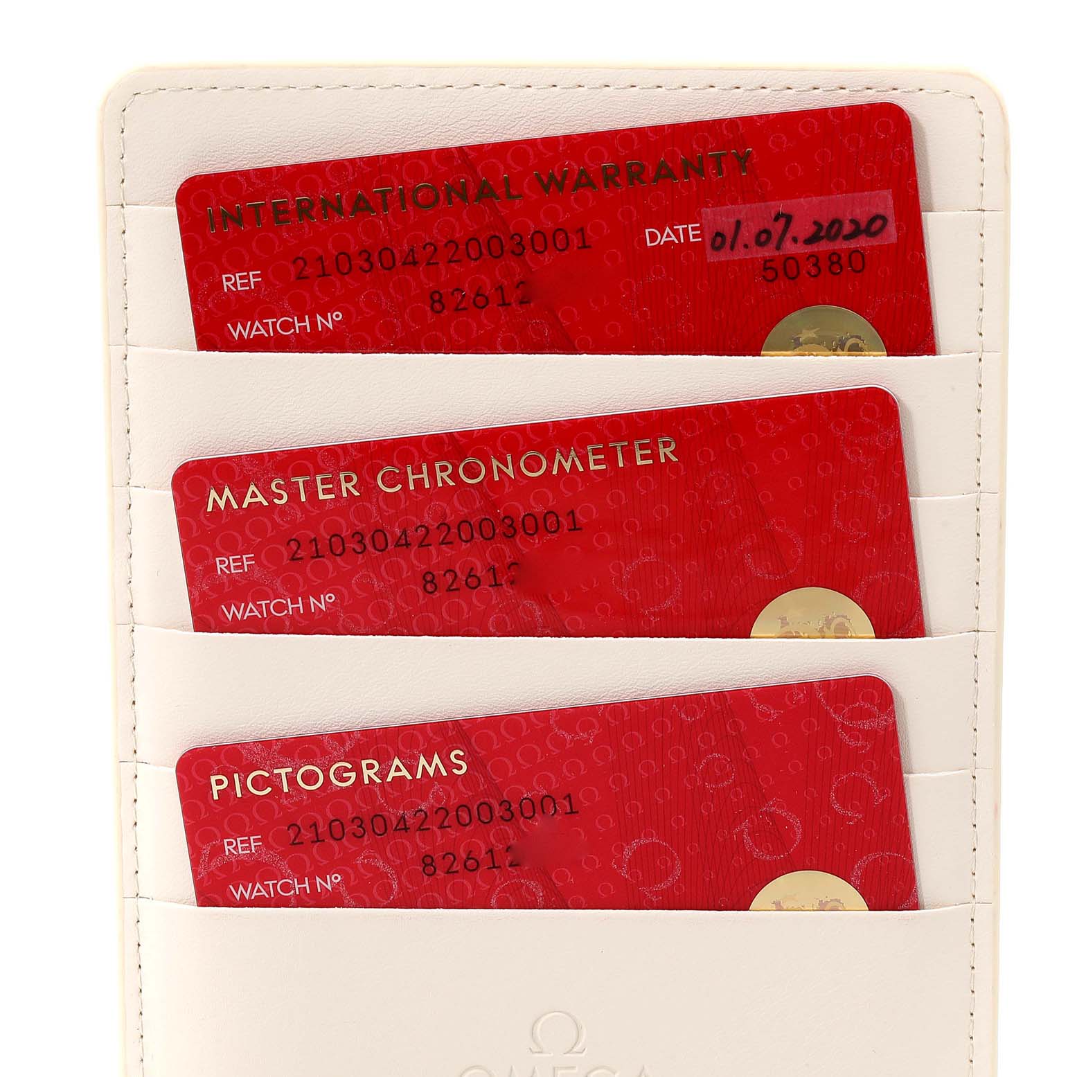 This image shows warranty and certification cards in a holder for the Omega Seamaster 210.30.42.20.03.001 Men's Stainless Steel Blue Dial 210.30.42.20.03.001 Men's Stainless Steel Blue Dial watch model.