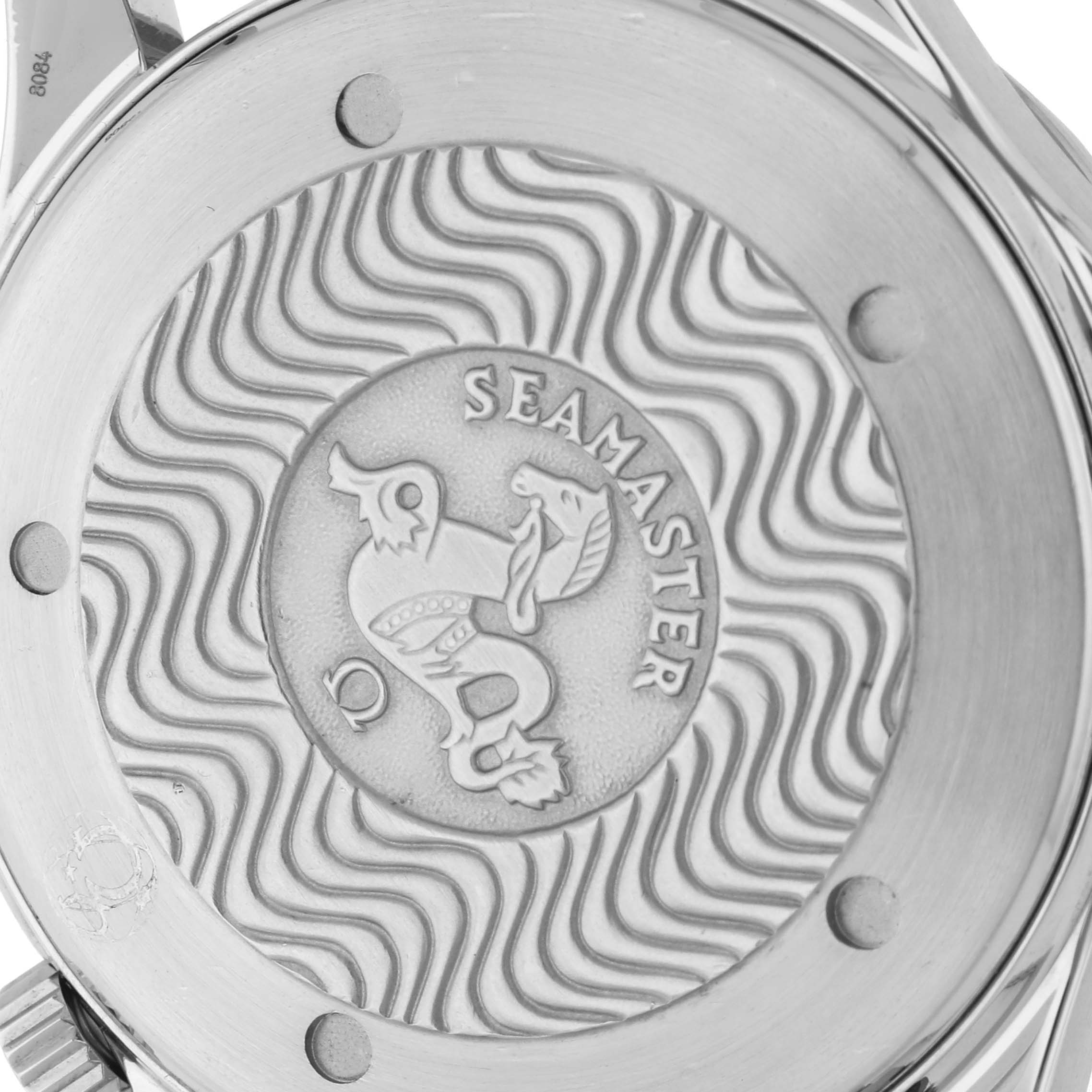 The image shows the back case of an Omega Seamaster 2531.80.00 Men
s Stainless Steel Blue Dial watch, featuring the embossed logo and wavy pattern.