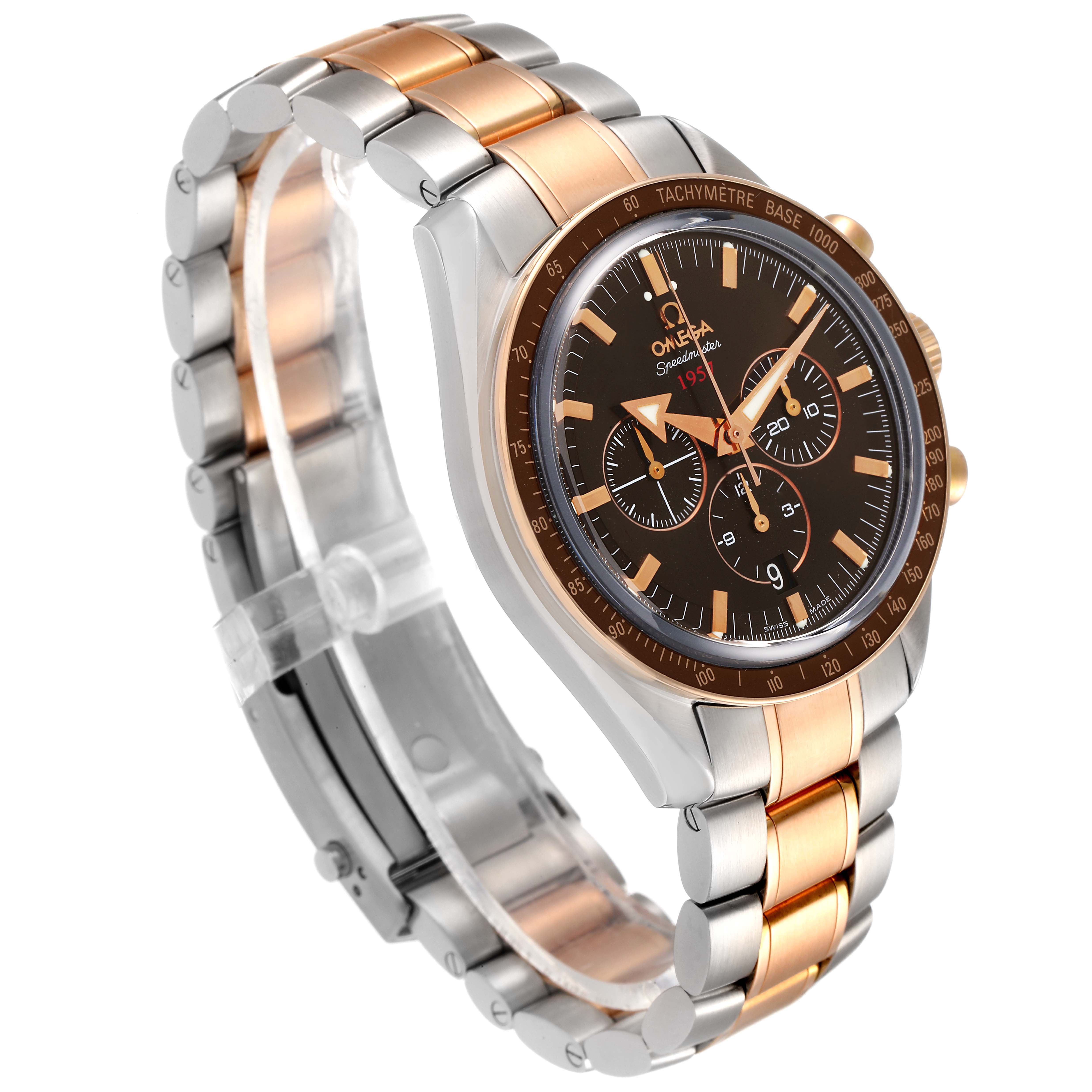 The Omega Speedmaster 321.90.42.50.13.001 Men's Steel and Gold (two tone) Brown Dial 321.90.42.50.13.001 Men's Steel and Gold (two tone) Brown Dial watch is shown at an angled view, highlighting its dial, bezel, and two-tone metal bracelet.