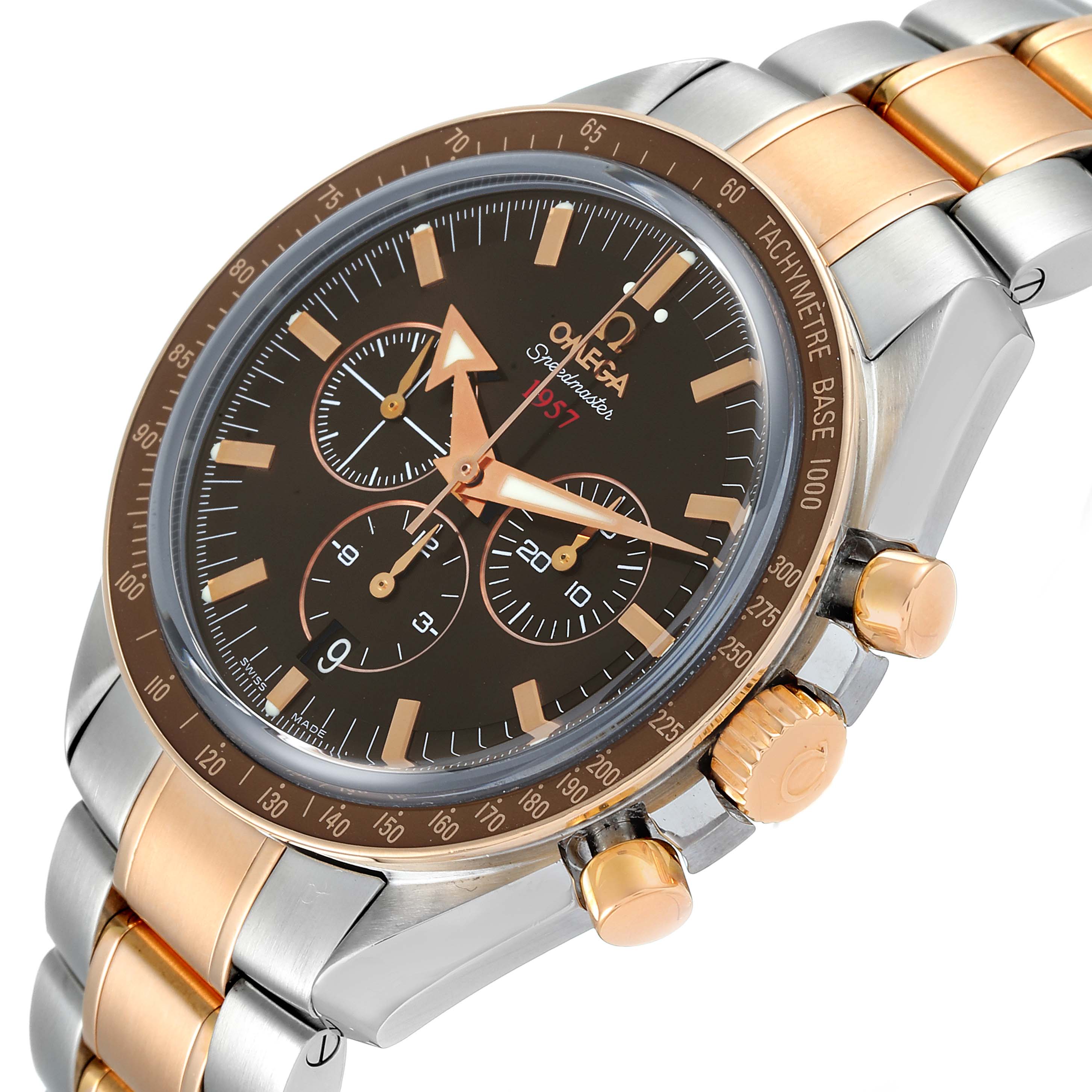 The Omega Speedmaster 321.90.42.50.13.001 Men's Steel and Gold (two tone) Brown Dial 321.90.42.50.13.001 Men's Steel and Gold (two tone) Brown Dial watch is shown at an angled side view, highlighting its dial, bezel, crown, and two-tone bracelet.