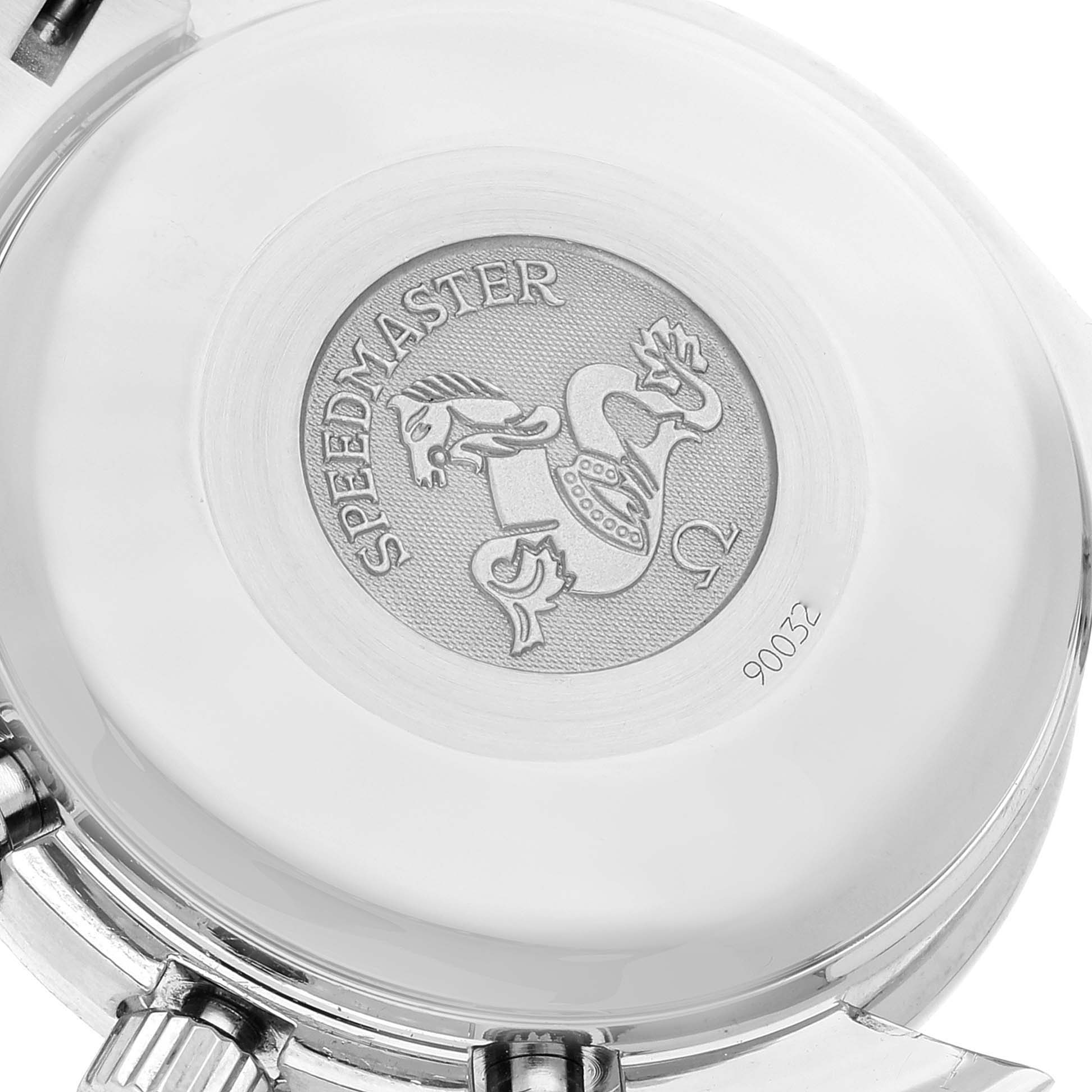 The image shows the back case of an Omega Speedmaster 3513.46.00 Men
s Stainless Steel Blue Dial 3513.46.00 Men
s Stainless Steel Blue Dial watch, highlighting the engraved logo and branding.