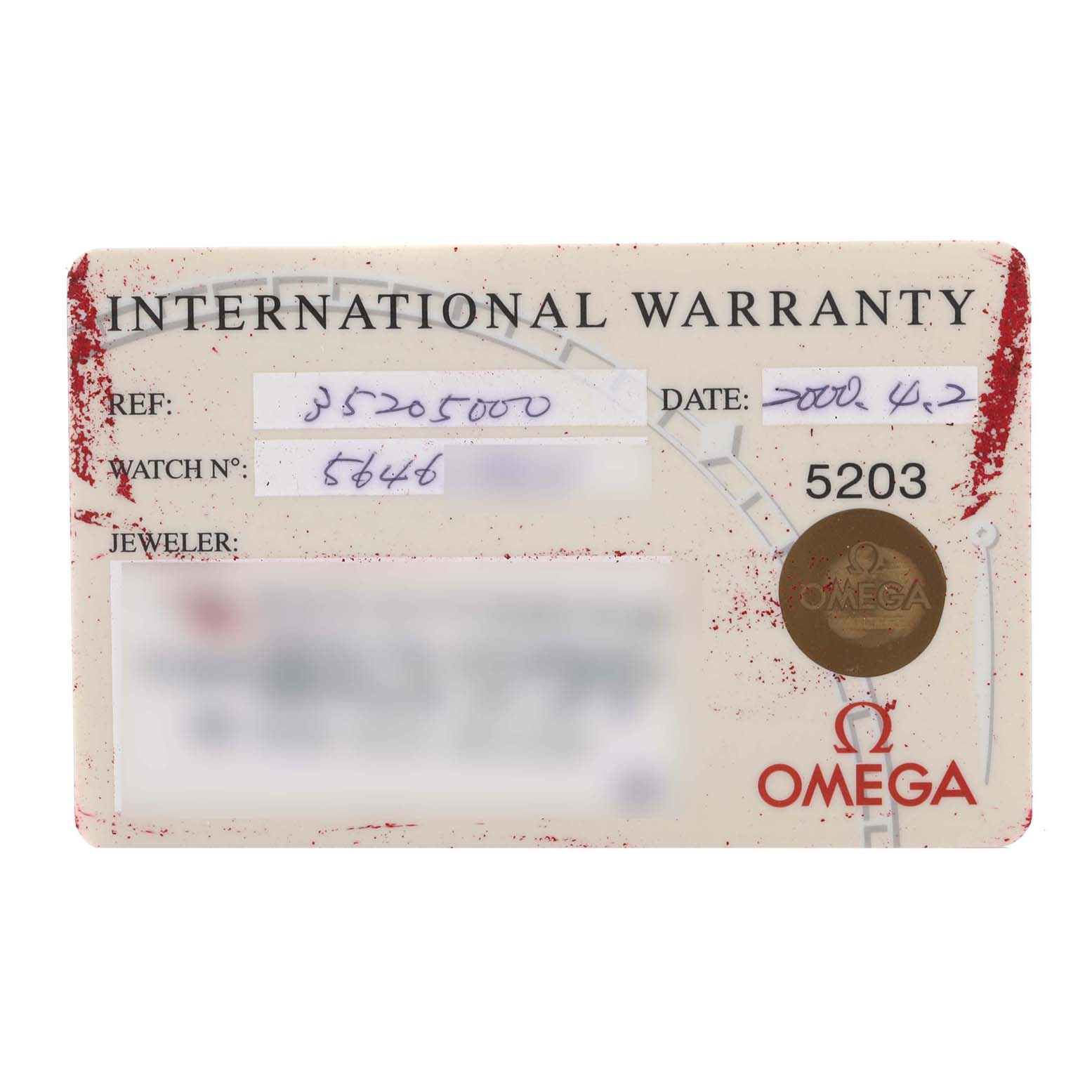 The image shows the international warranty card for the Omega Speedmaster 3520.50.00 Men
s Stainless Steel Black Dial 3520.50.00 Men
s Stainless Steel Black Dial watch.
