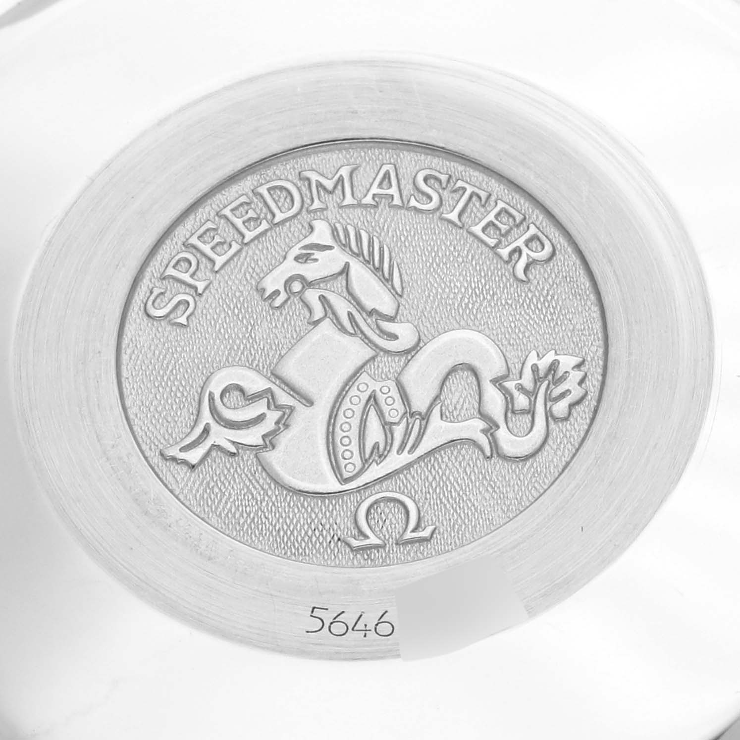 The image shows the engraved back case of the Omega Speedmaster 3520.50.00 Men
s Stainless Steel Black Dial 3520.50.00 Men
s Stainless Steel Black Dial with the brand logo and decorative design.