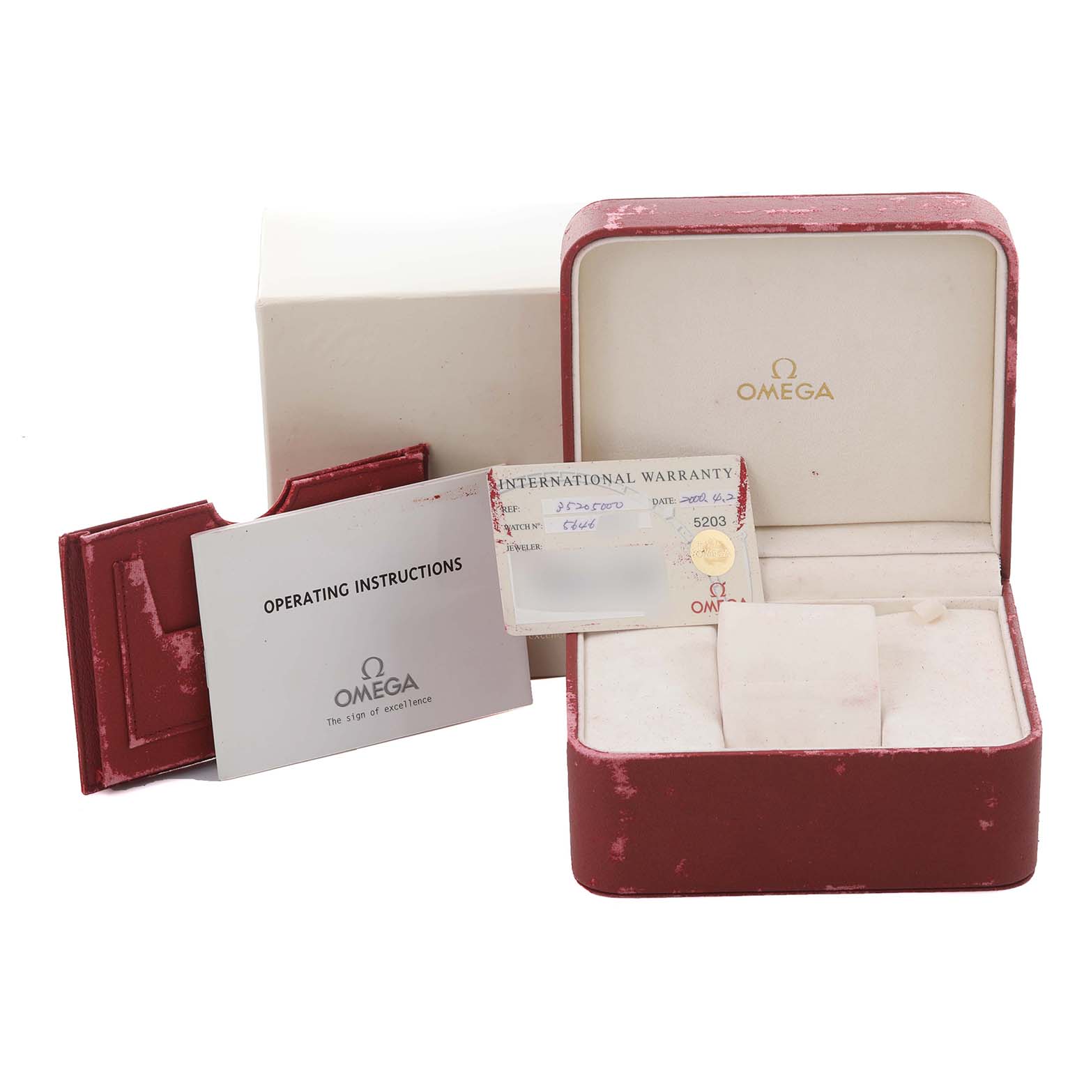 The image shows an Omega Speedmaster 3520.50.00 Men
s Stainless Steel Black Dial 3520.50.00 Men
s Stainless Steel Black Dial box, operating instructions, and international warranty card, viewed from a frontal angle.