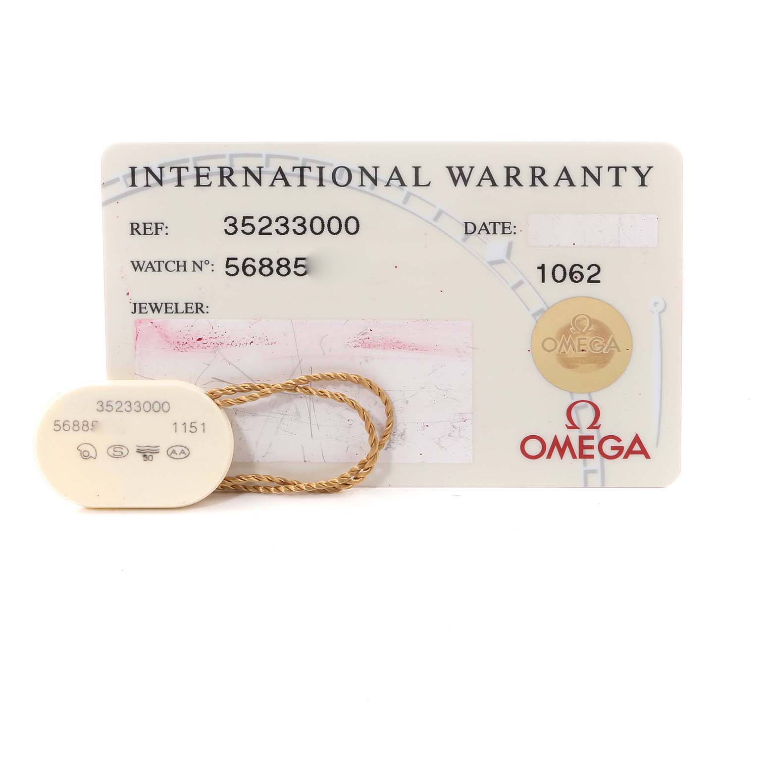 The image shows the international warranty card and a small tag for the Omega Speedmaster 3523.30.00 Men
s Stainless Steel Silver Dial 3523.30.00 Men
s Stainless Steel Silver Dial watch.