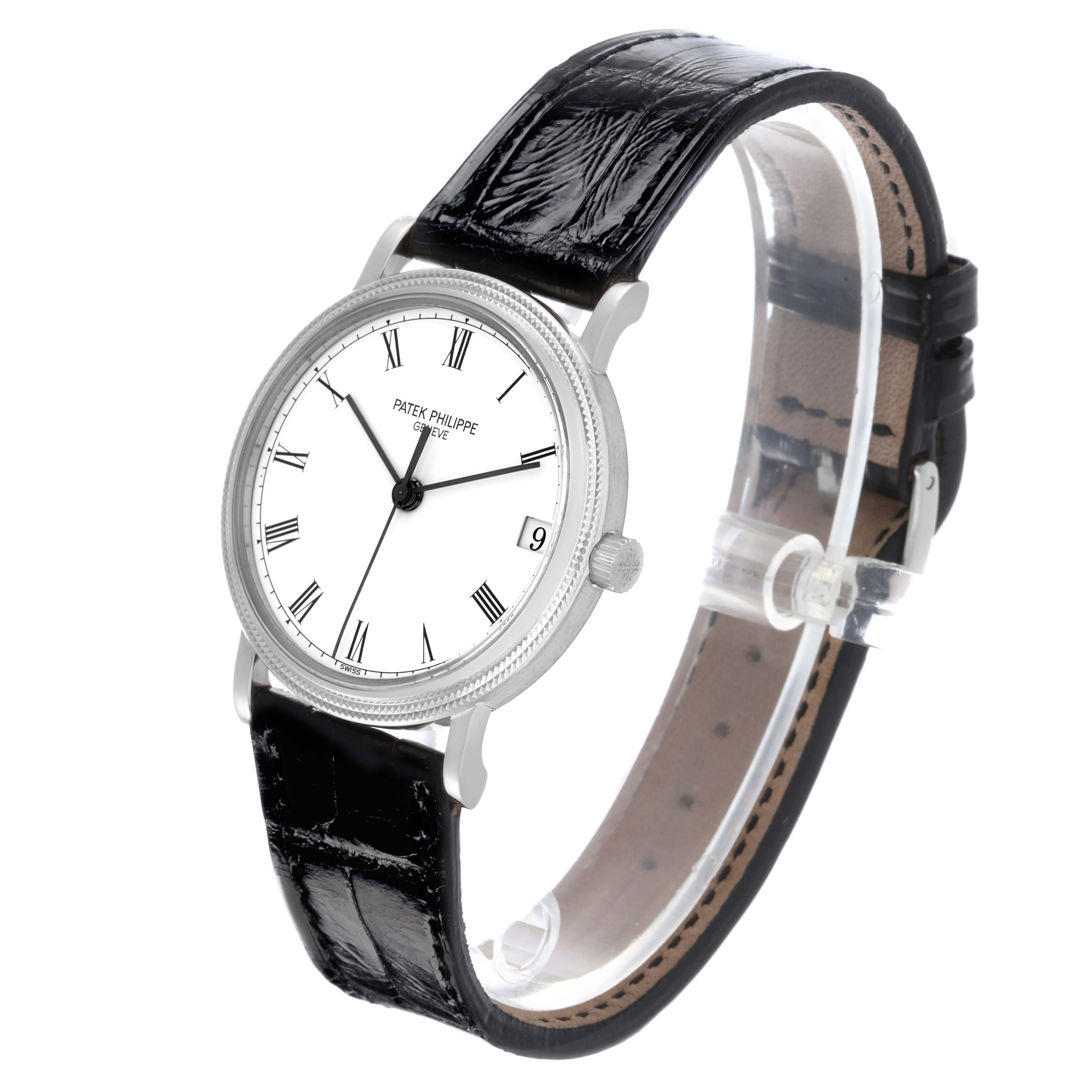 The Patek Philippe Calatrava 3802/200G-001 Men's White Gold White Dial watch is shown at a three-quarter angle, highlighting the dial, case, crown, and leather strap.