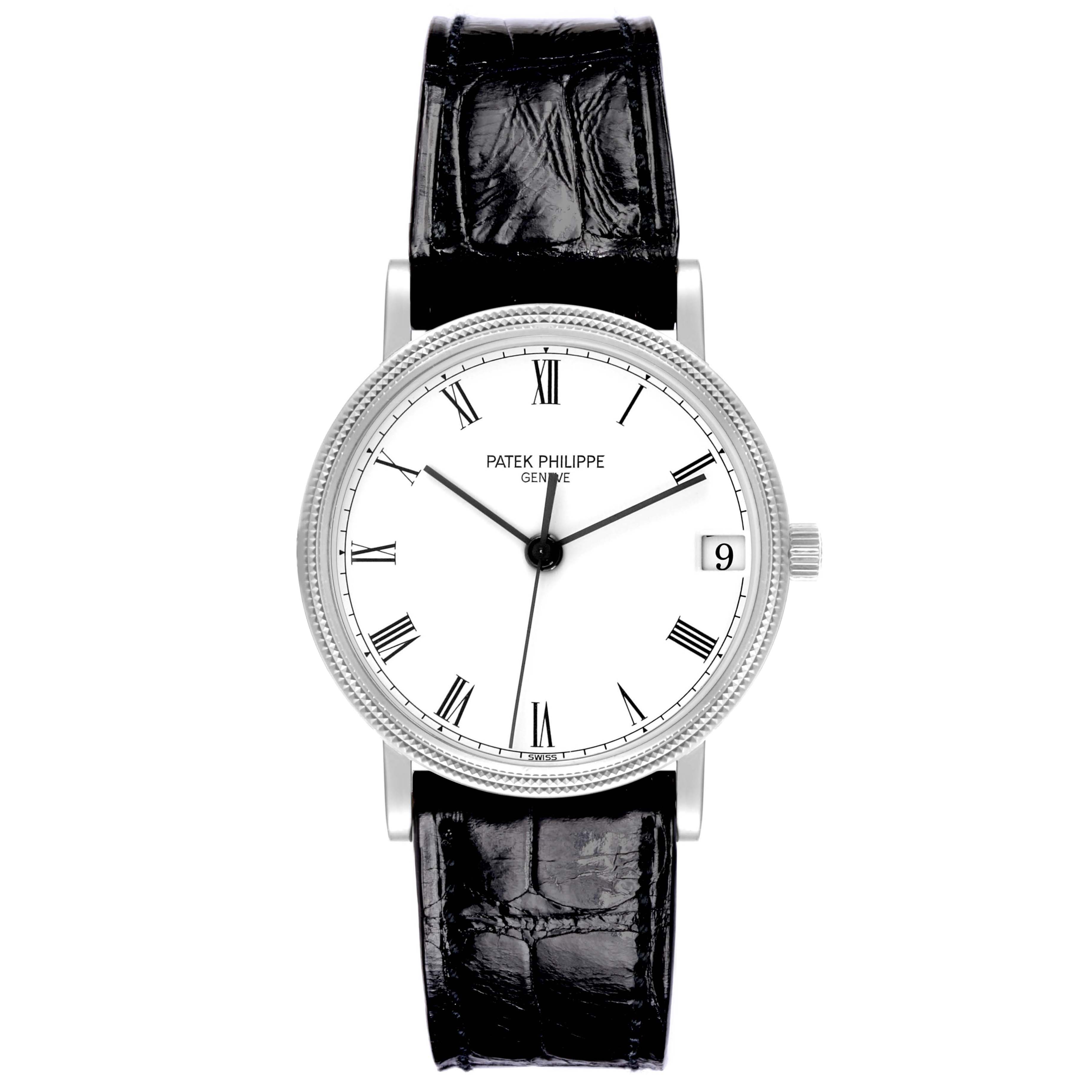 The image shows a front view of a Patek Philippe Calatrava 3802/200G-001 Men's White Gold White Dial watch, highlighting its dial, Roman numerals, and black strap.