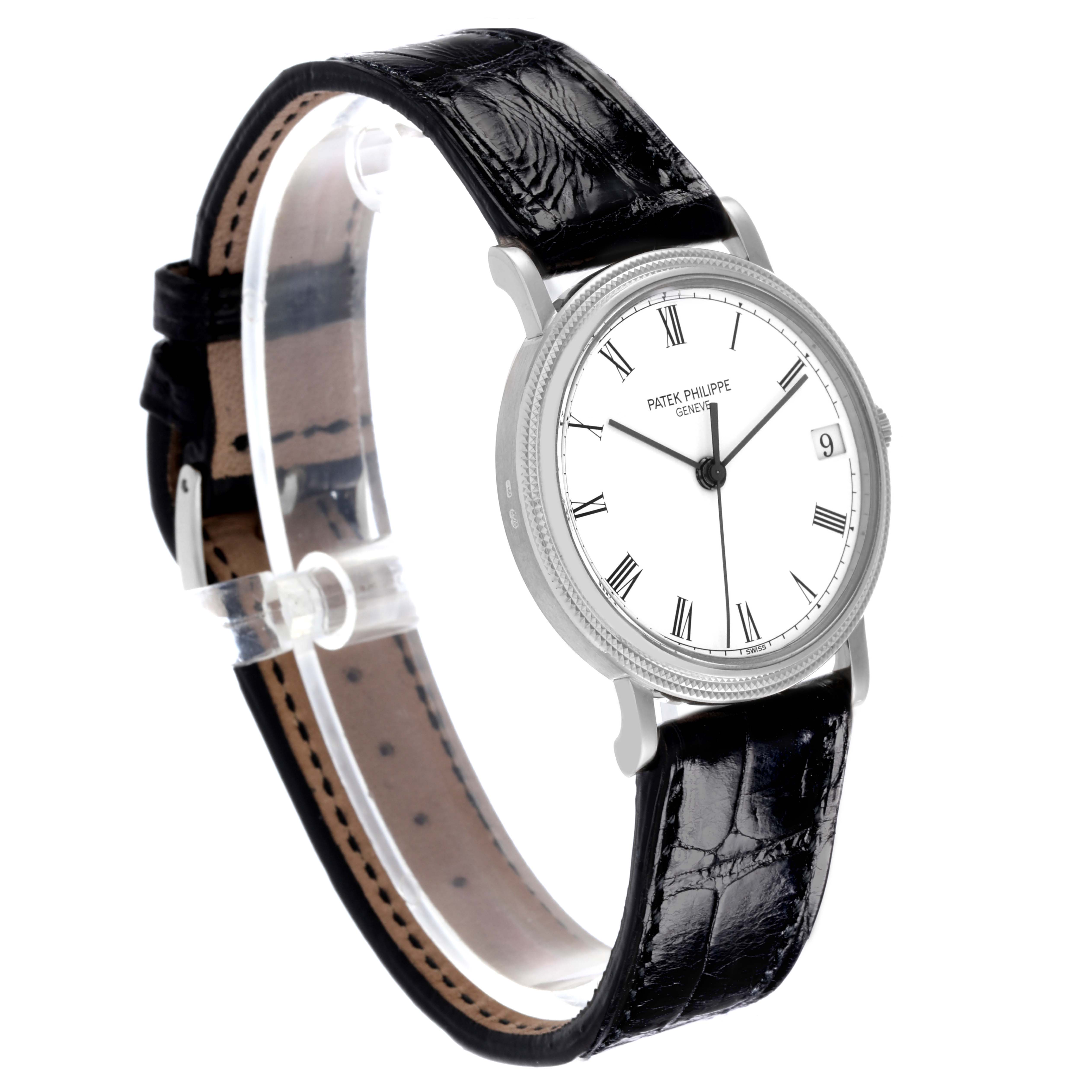 The Patek Philippe Calatrava 3802/200G-001 Men
s White Gold White Dial 3802/200G-001 Men
s White Gold White Dial watch is shown at a three-quarter angle, displaying the face, bezel, and leather strap.