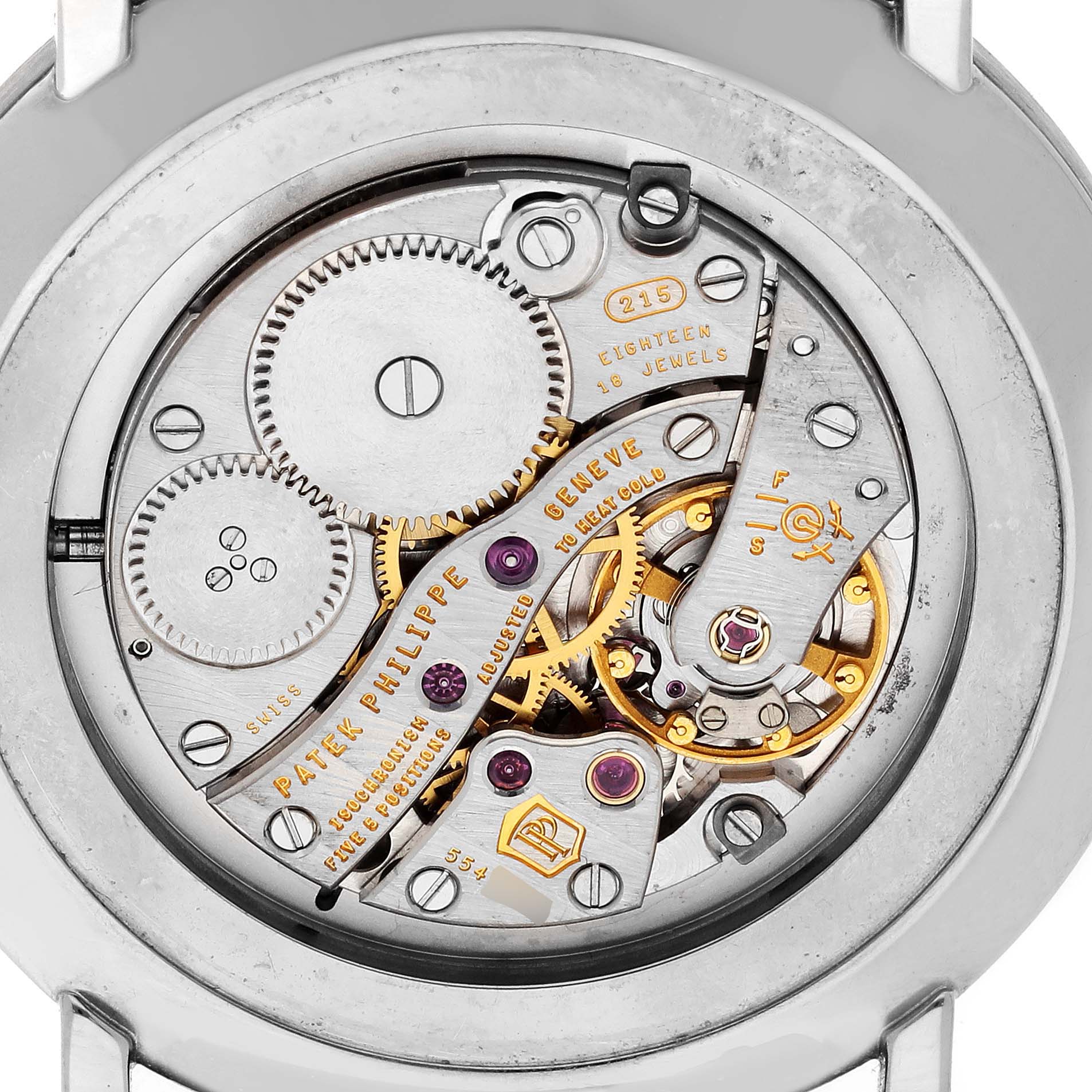 The image shows the back view of a Patek Philippe Calatrava 5119G-001 Men
s White Gold White Dial 5119G-001 Men
s White Gold White Dial, highlighting its intricate mechanical movement.