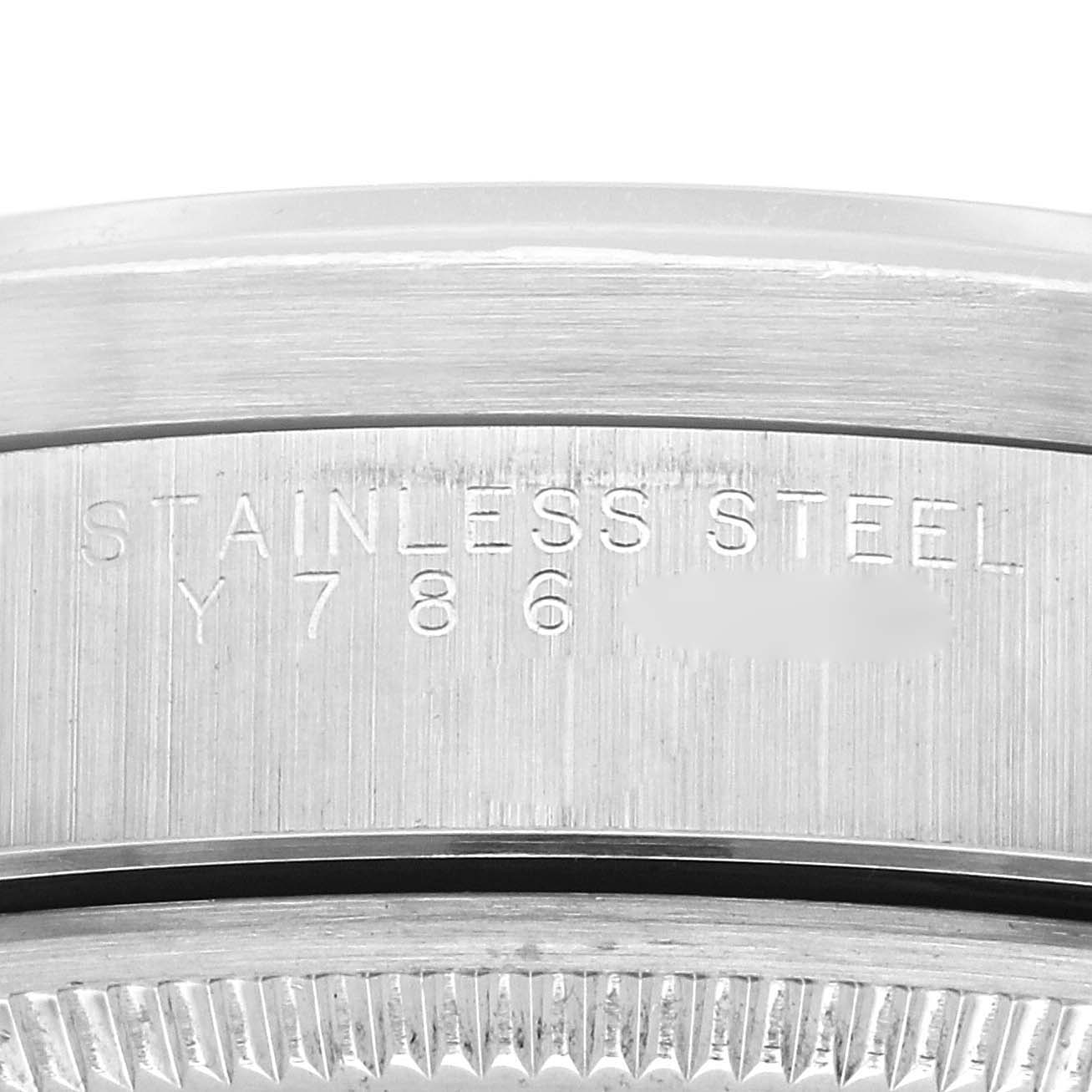 The image shows a close-up of the case side with "Stainless Steel" engraving on a Rolex Air-King 14010 Men
s Stainless Steel Silver Dial watch.
