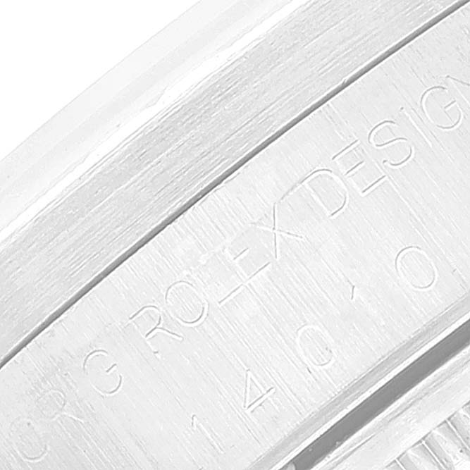 This close-up image features the engraved case back of a Rolex Air-King 14010 Men's Stainless Steel Silver Dial 14010 Men's Stainless Steel Silver Dial watch.