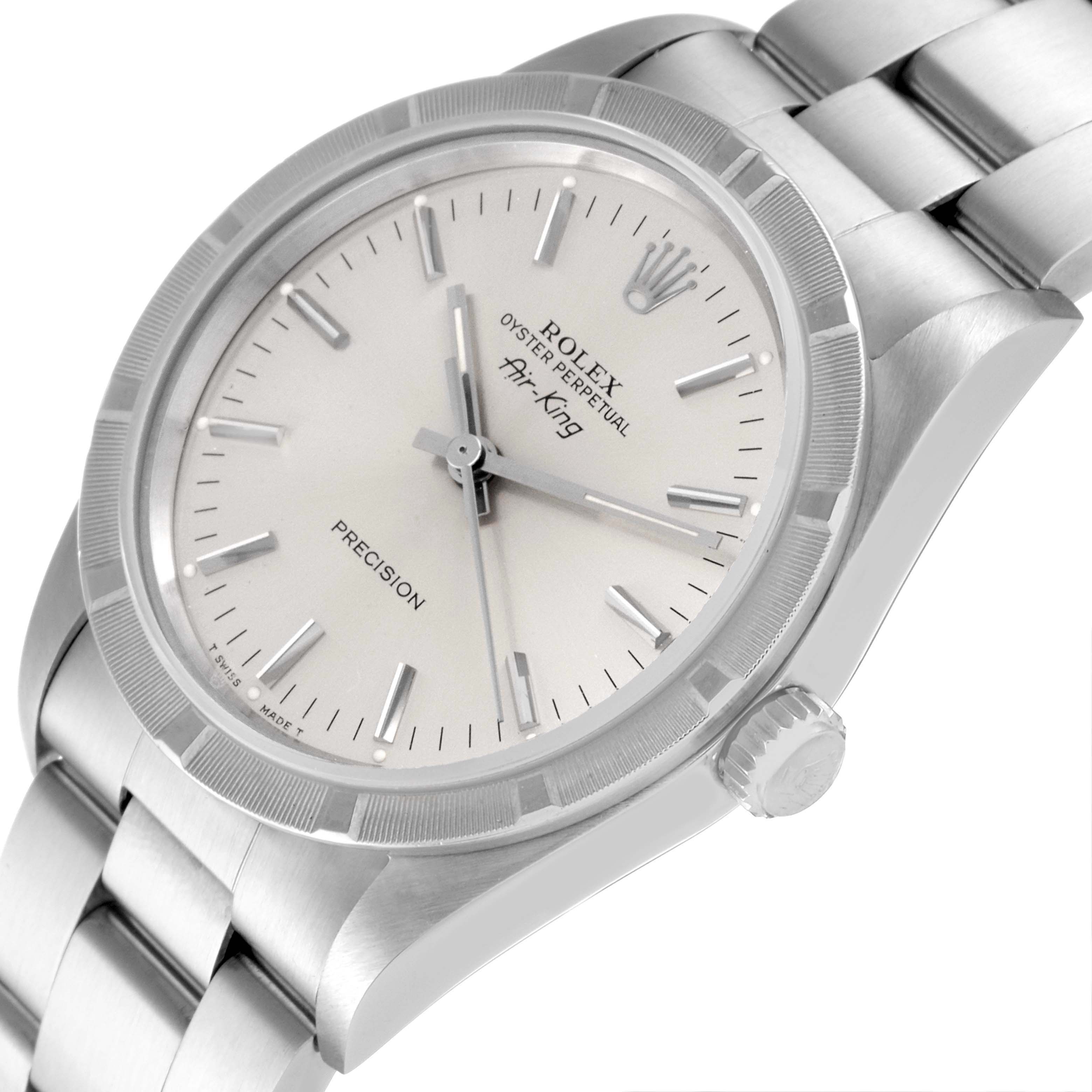 This image shows a Rolex Air-King 14010 Men's Stainless Steel Silver Dial 14010 Men's Stainless Steel Silver Dial watch angled slightly to the right, featuring the face, bezel, crown, and part of the bracelet.