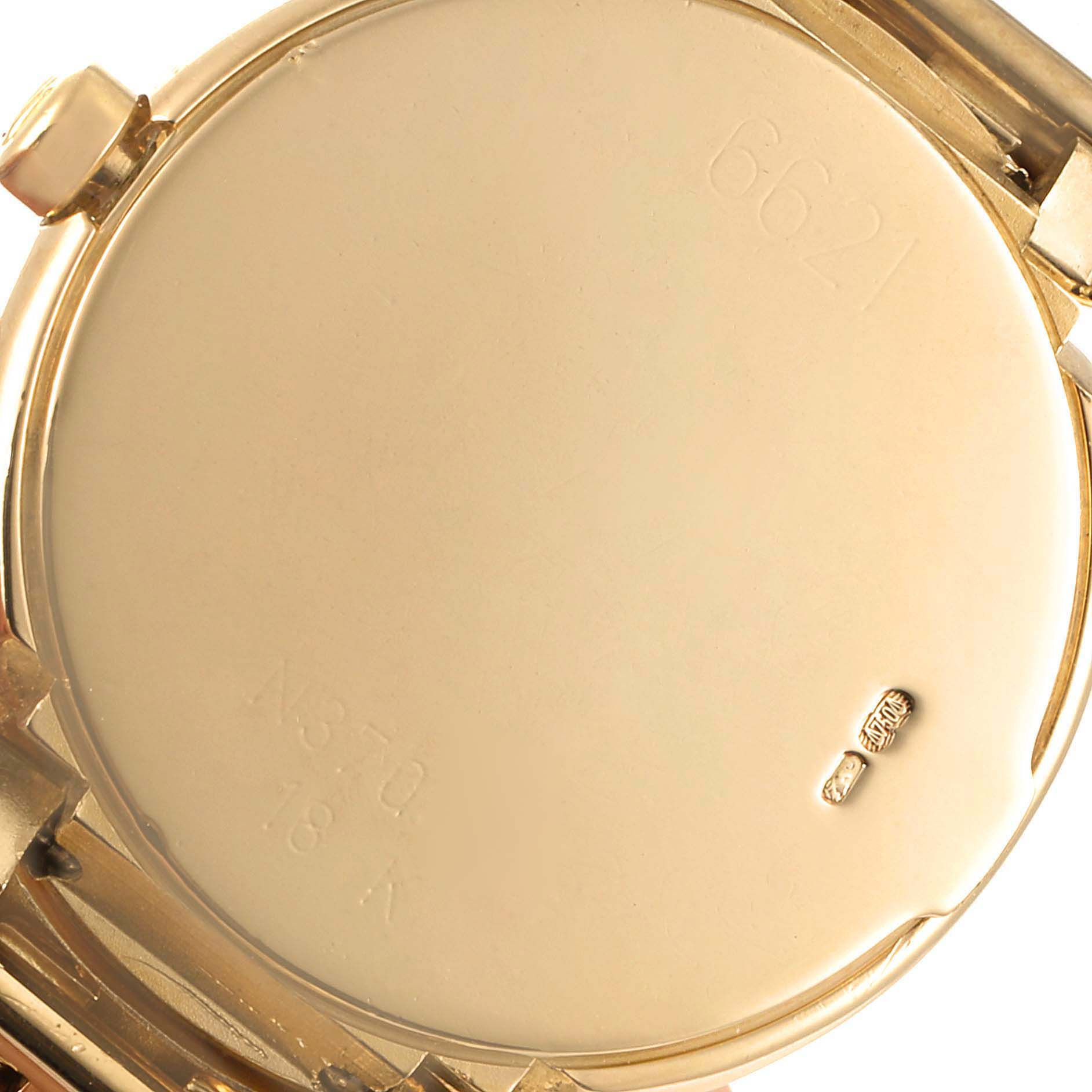 The image shows the back case of a Rolex Cellini 6621 Women's Yellow Gold Beige Dial 6621 Women's Yellow Gold Beige Dial watch, displaying the engravings and hallmark.