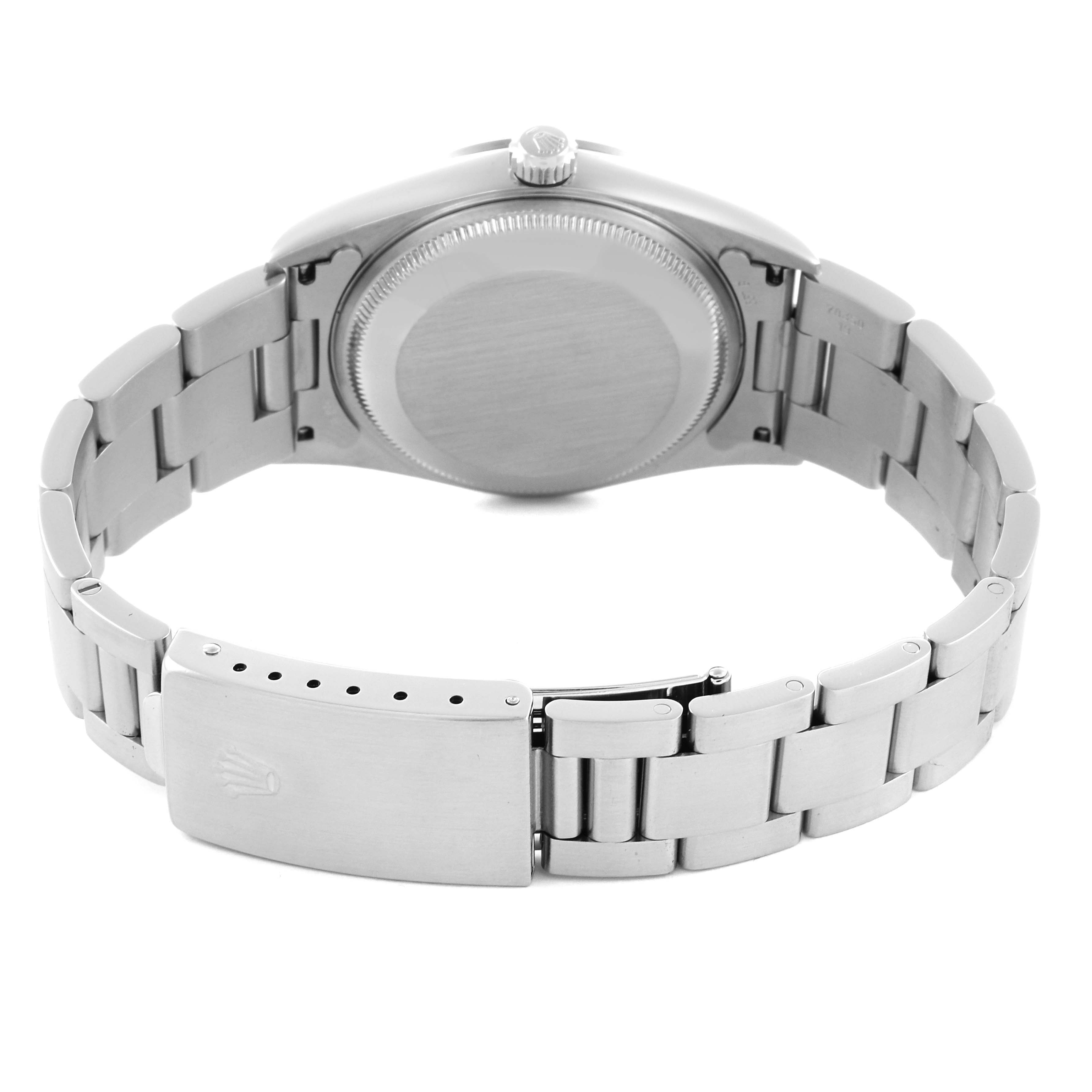 The Rolex Date 15200 Men's Stainless Steel Blue Dial 15200 Men's Stainless Steel Blue Dial model is shown from the back, highlighting the bracelet, clasp, and case back.