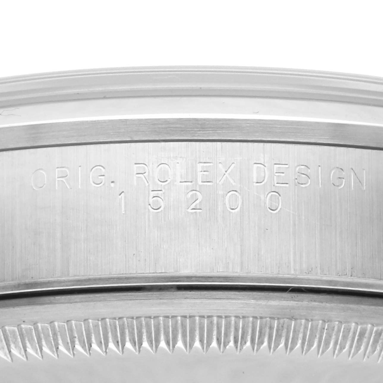 The image shows a close-up of the side of a Rolex Date 15200 Men's Stainless Steel Blue Dial 15200 Men's Stainless Steel Blue Dial model, highlighting the engraved design and model number.