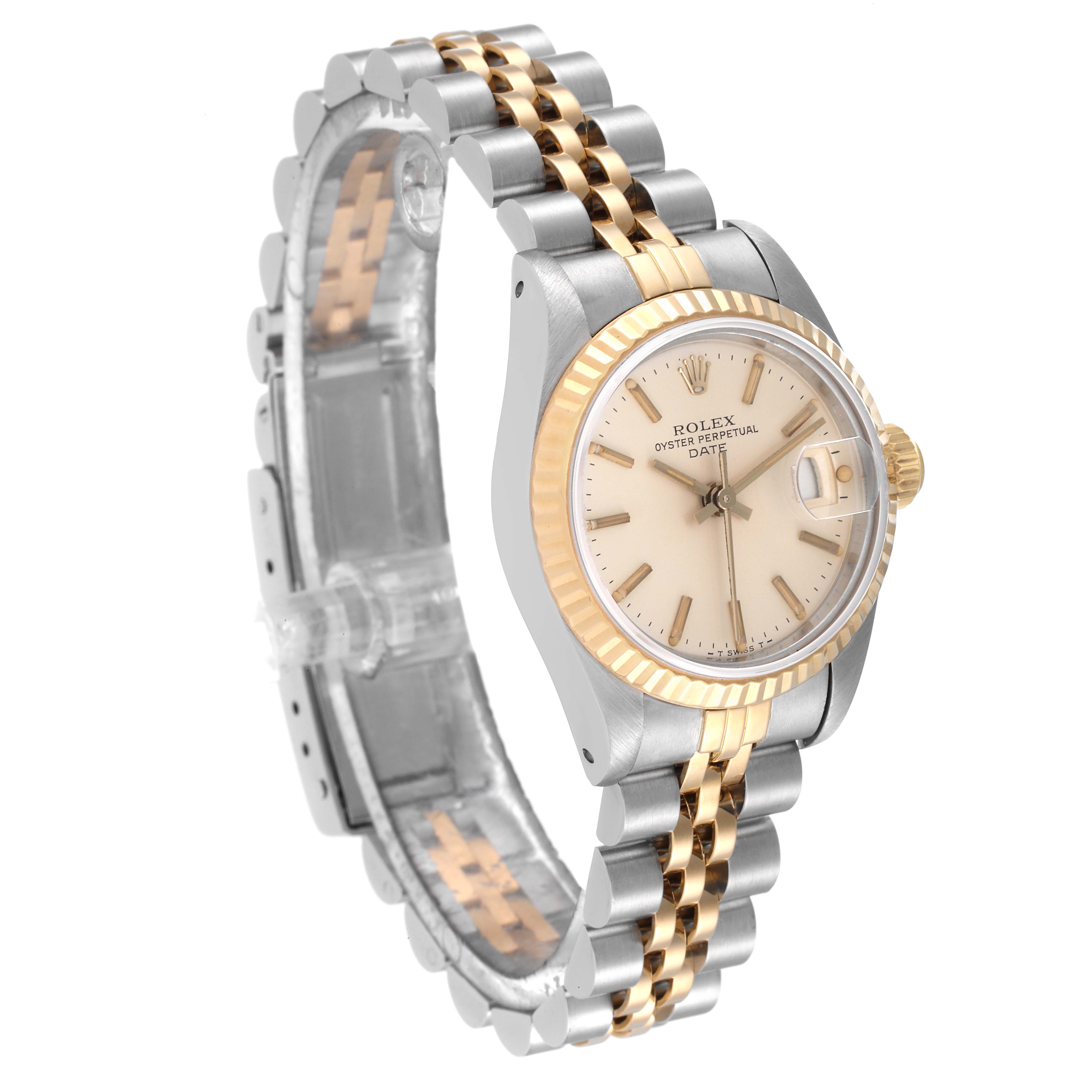 The image shows a Rolex Date 69173 Women's Steel and Gold (two tone) Silver Dial 69173 Women's Steel and Gold (two tone) Silver Dial model watch angled to display its face, bi-color bezel, and two-tone bracelet.