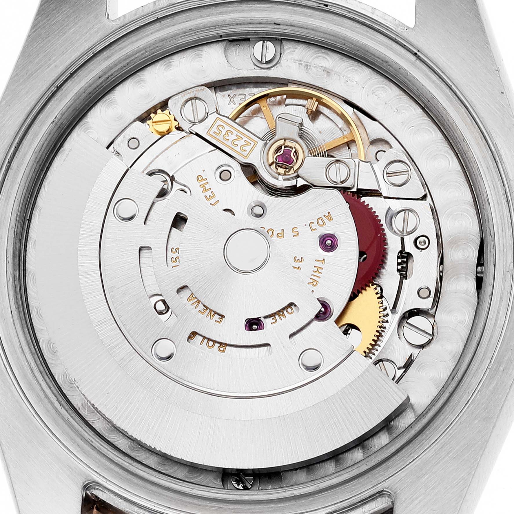 This is a detailed view of the movement mechanism of a Rolex Mid-Size 178341 Women
s Steel and Gold (two tone) Mother of Pearl Dial 178341 Women
s Steel and Gold (two tone) Mother of Pearl Dial watch, showing the inner components.