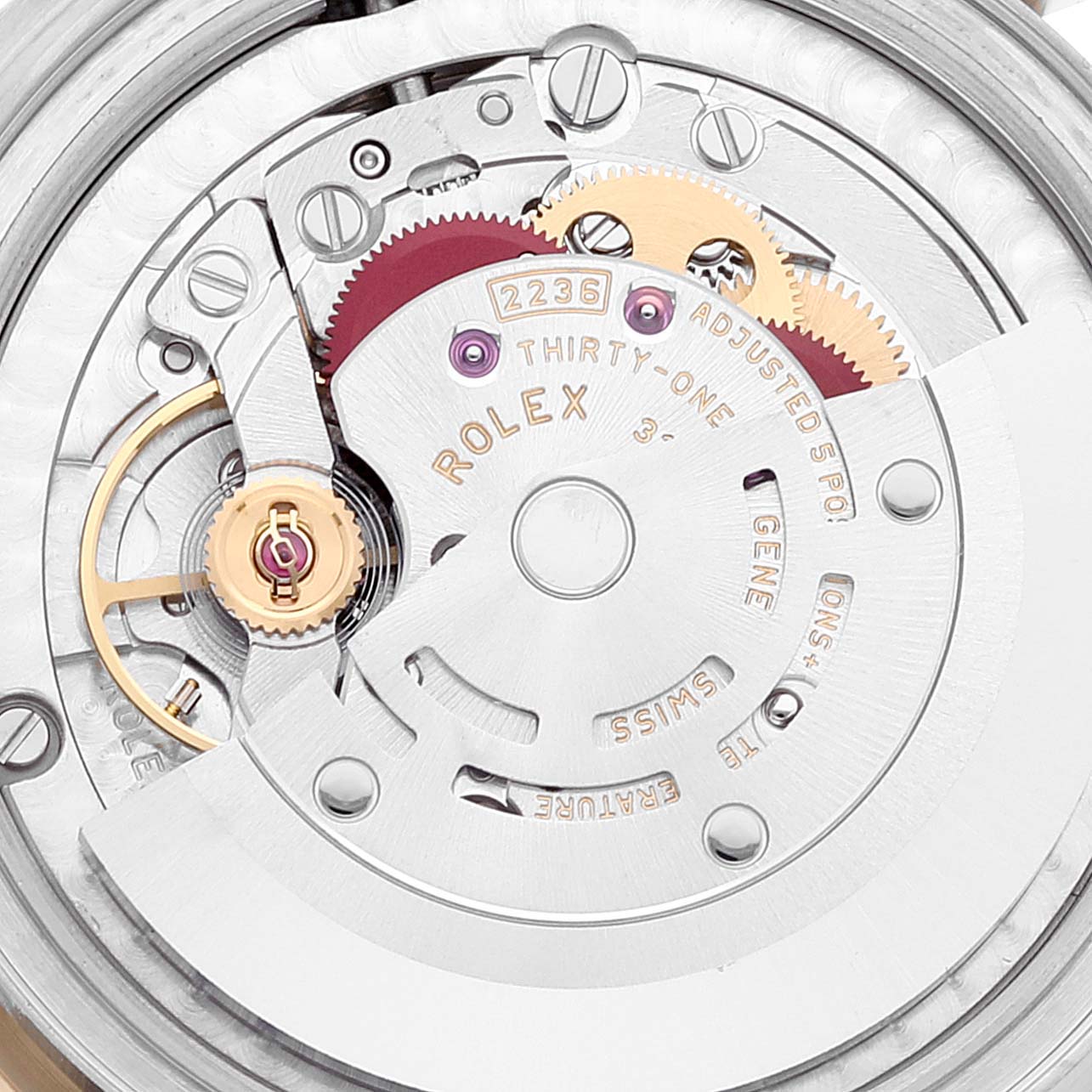 This image shows the intricate internal mechanism of a mid-size Rolex watch, focusing on gears and the movement component.