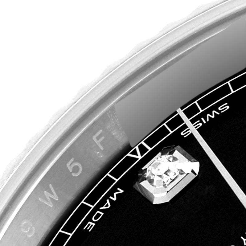 This close-up image of the Rolex Datejust 41 126334 Men
s Stainless Steel Black Dial 126334 Men
s Stainless Steel Black Dial watch shows a portion of the dial, minute marker, and gemstone hour marker.