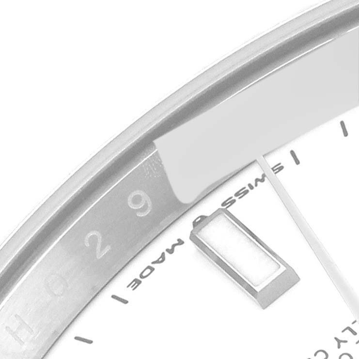 The image shows a close-up of the bezel and dial edge of the Rolex Datejust 41 126334 Men's Stainless Steel White Dial 126334 Men's Stainless Steel White Dial, highlighting the 29-minute marker and part of an hour marker.