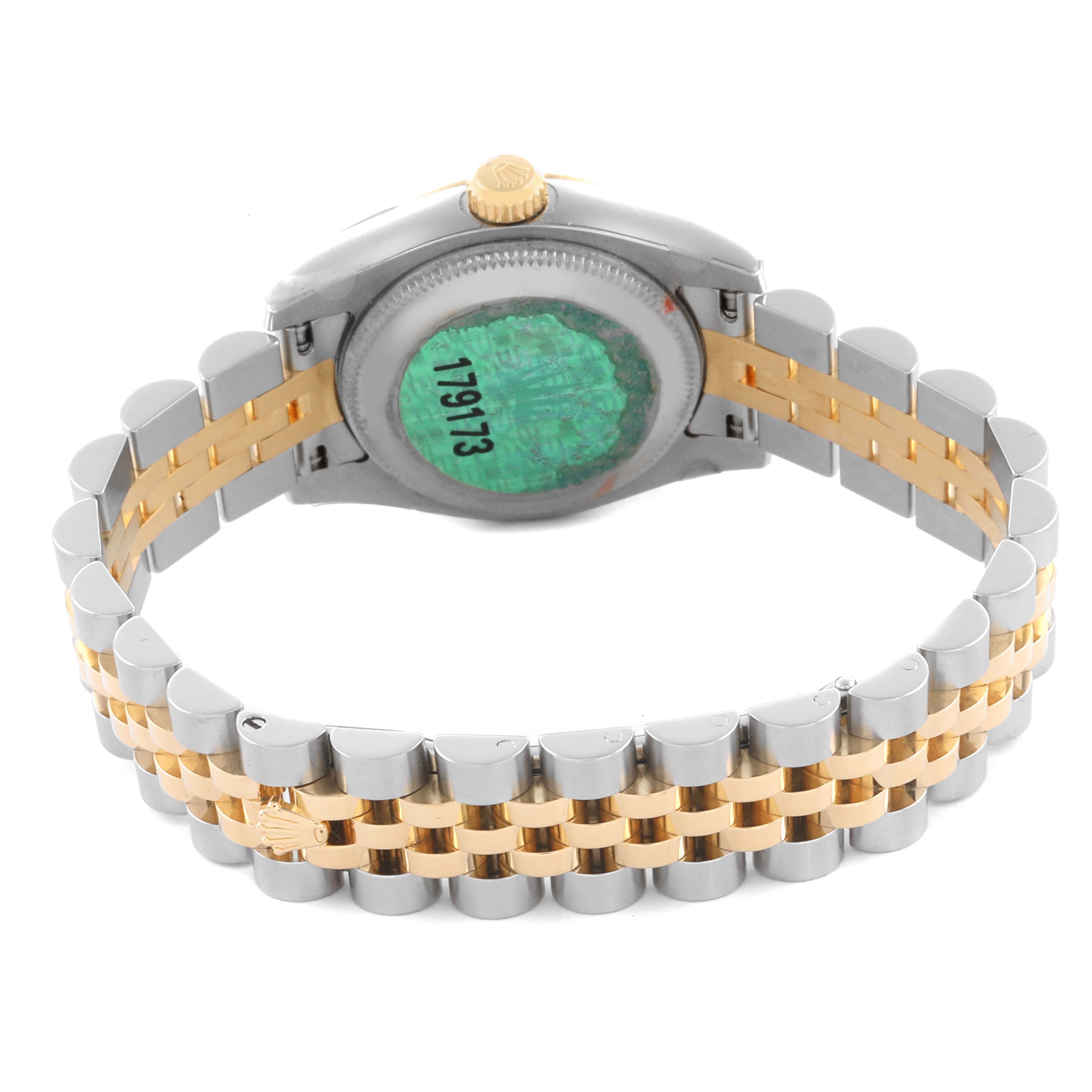 The image shows the back view of a Rolex Datejust 179173 Women's Steel and Gold (two tone) Black Dial 179173 Women's Steel and Gold (two tone) Black Dial watch, highlighting the case back and two-tone bracelet.