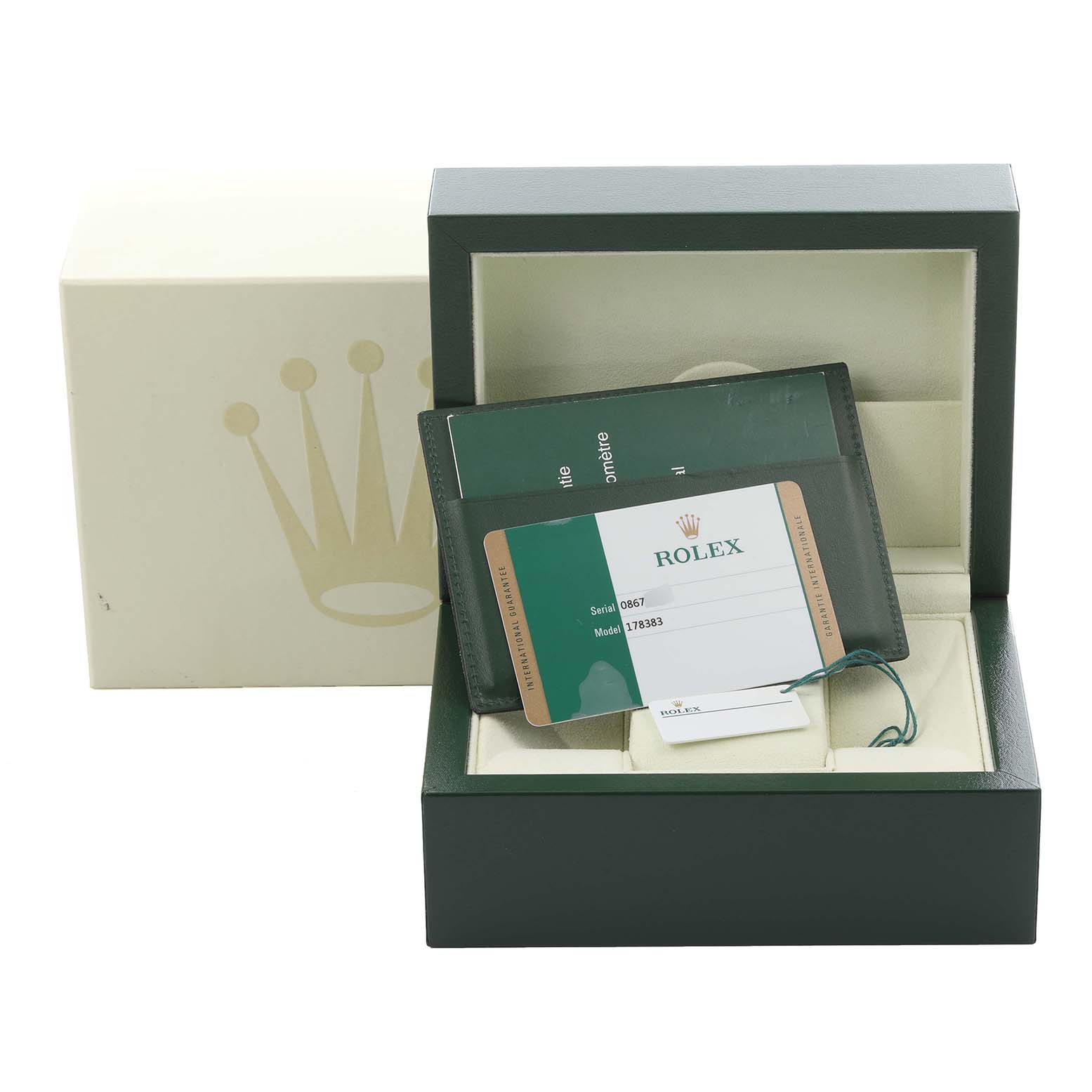 The image shows Rolex packaging for a Mid-Size model, including the box, warranty card, and papers inside.