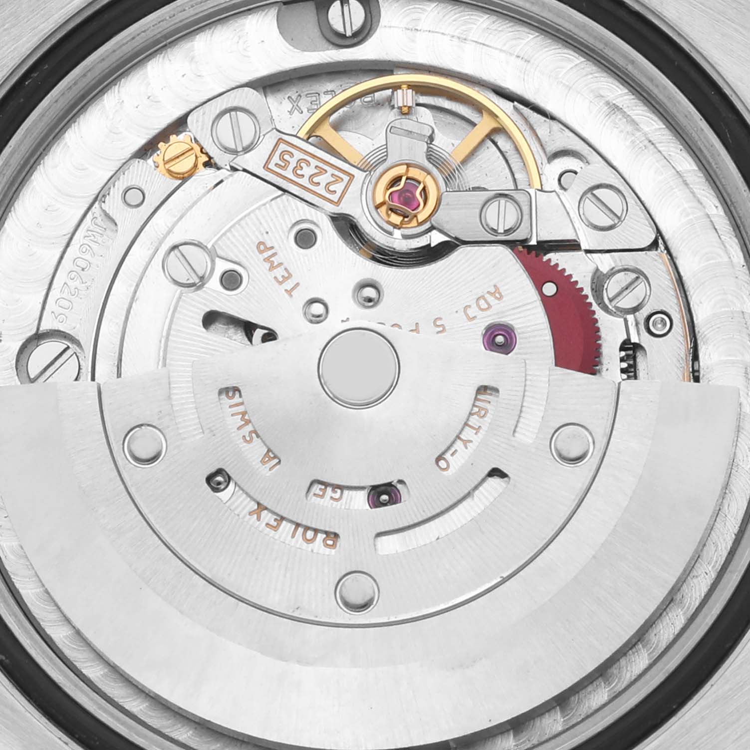 The image shows the movement of a Rolex Mid-Size M178383-0008 Women's Steel and Gold (two tone) Champagne Dial M178383-0008 Women's Steel and Gold (two tone) Champagne Dial model from the top angle, highlighting the rotor and gears.
