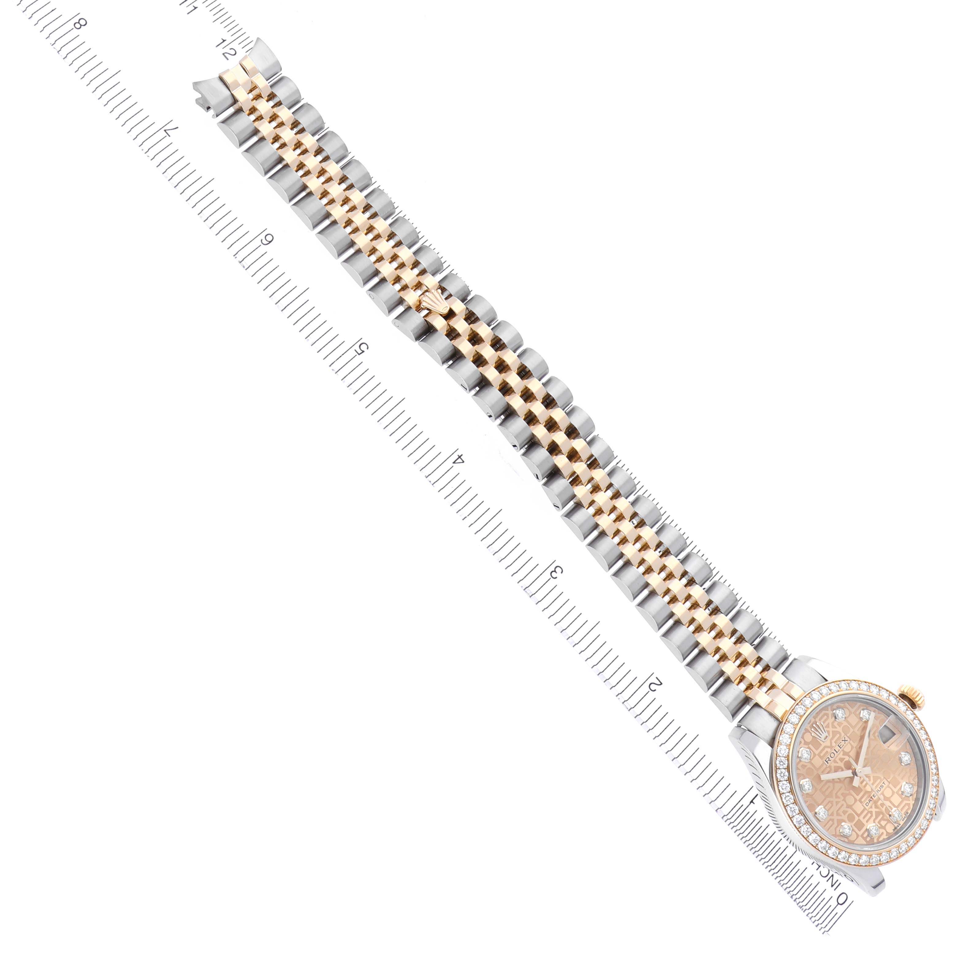 The Rolex Mid-Size M178383-0008 Women's Steel and Gold (two tone) Champagne Dial M178383-0008 Women's Steel and Gold (two tone) Champagne Dial watch is shown from a top-down angle, featuring the full bracelet and dial face.