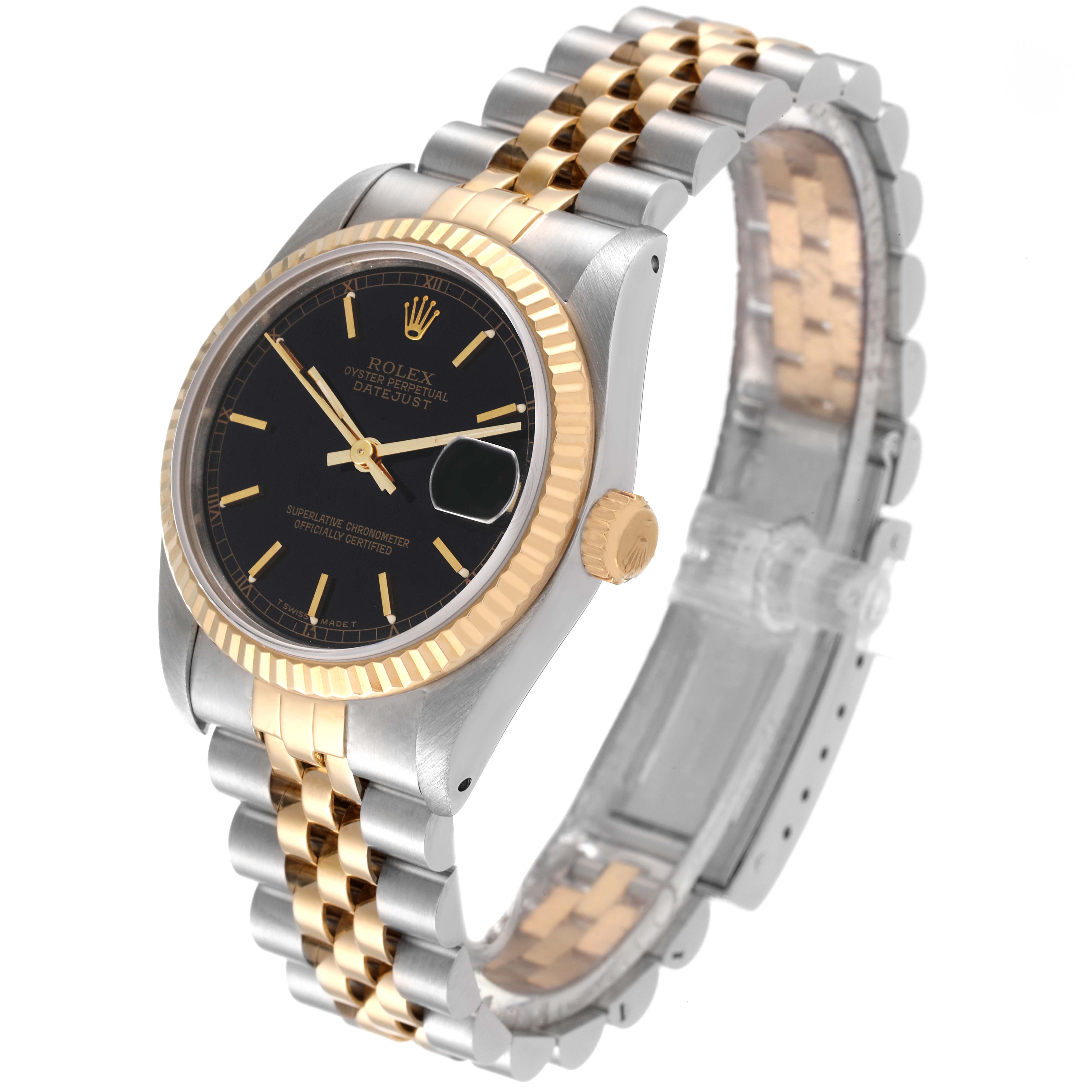 The image shows a Rolex Mid-Size 68273 Women
s Steel and Gold (two tone) Black Dial 68273 Women
s Steel and Gold (two tone) Black Dial Datejust watch at a slight angle, displaying its gold and silver bracelet, black dial, and fluted bezel.