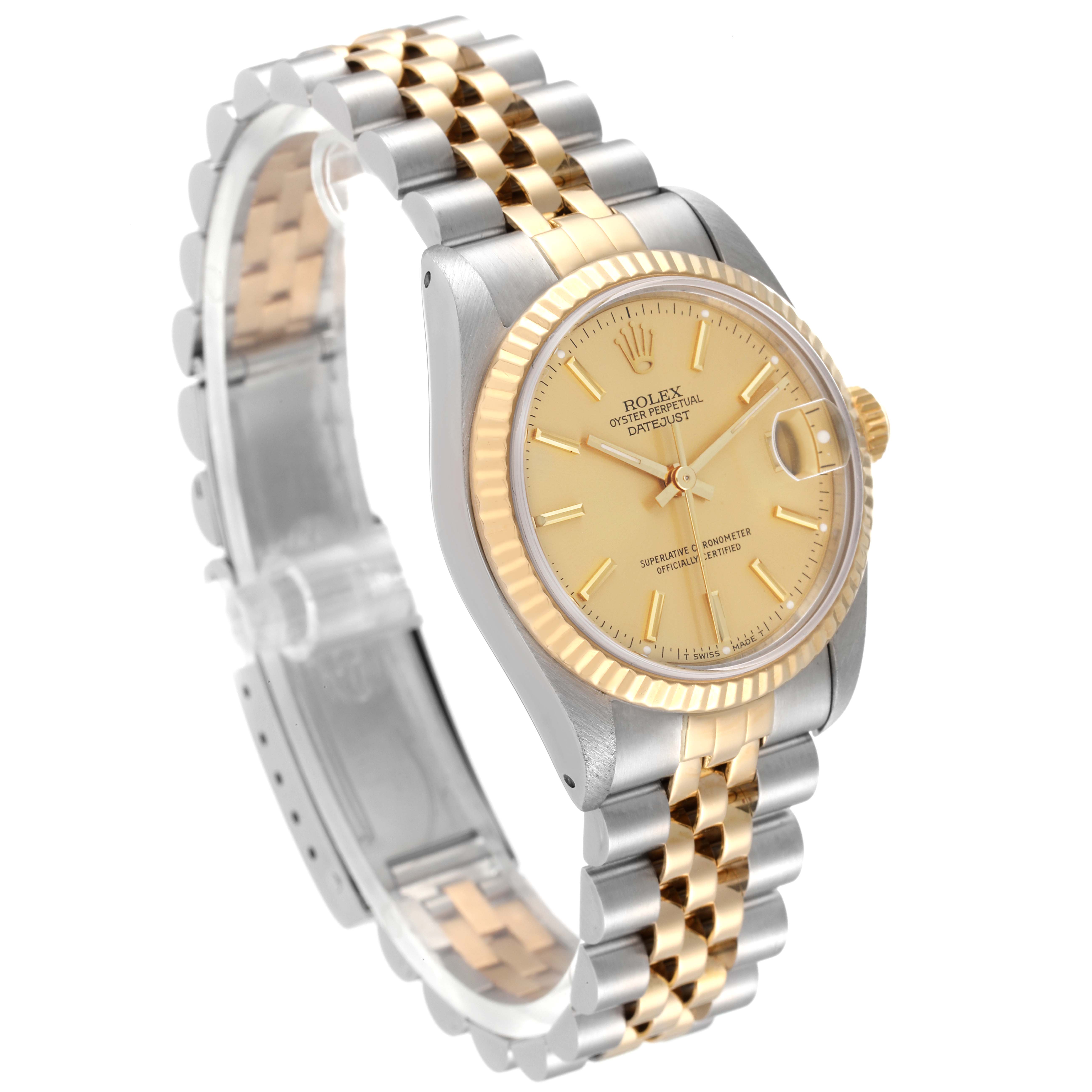 The image shows a side angle of a Mid-Size Rolex Oyster Perpetual Datejust, featuring its two-tone bracelet, case, and champagne dial.