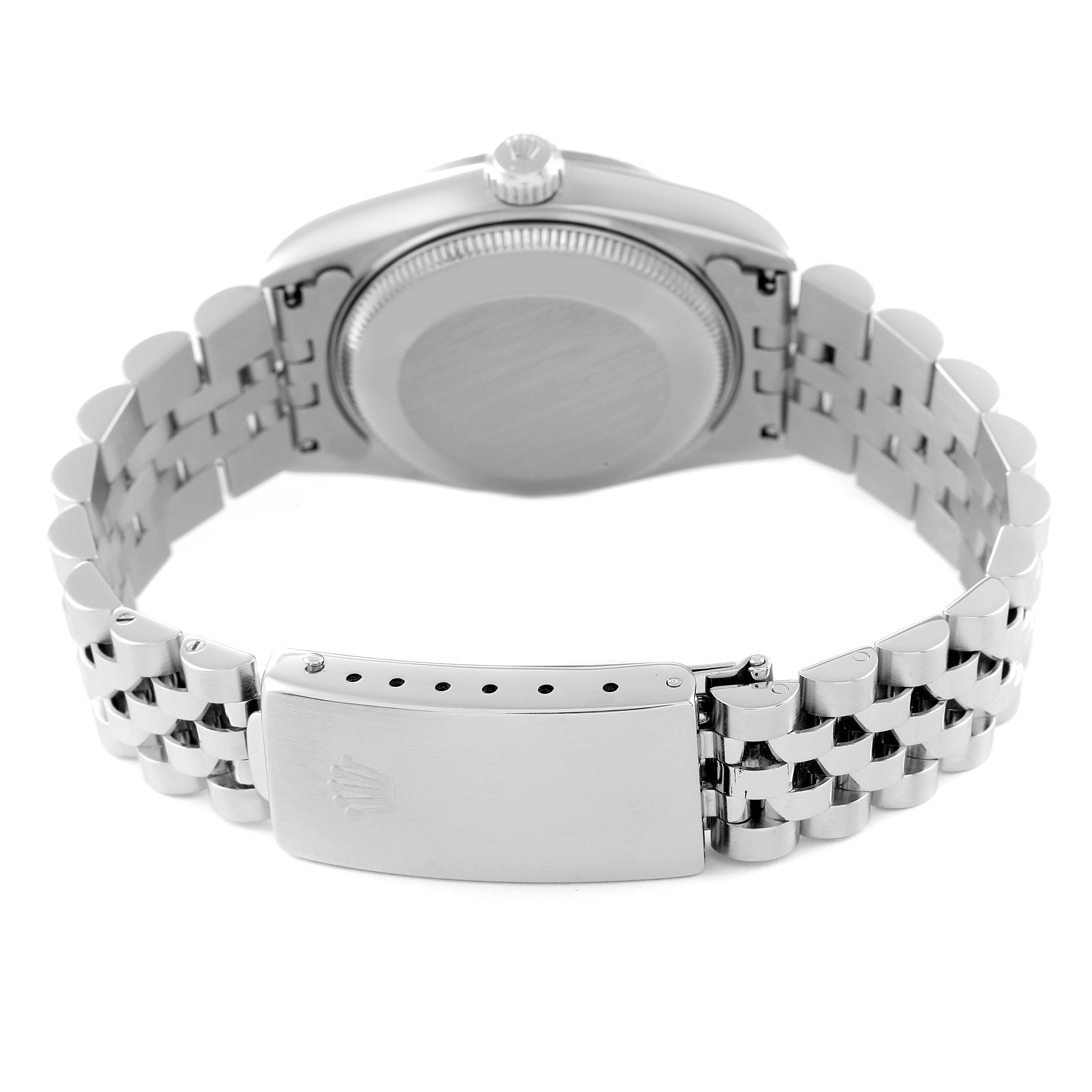 The image shows the back view of a Rolex Mid-Size 68274 Women's Stainless Steel Mother of Pearl Dial 68274 Women's Stainless Steel Mother of Pearl Dial watch, featuring its clasp and bracelet.