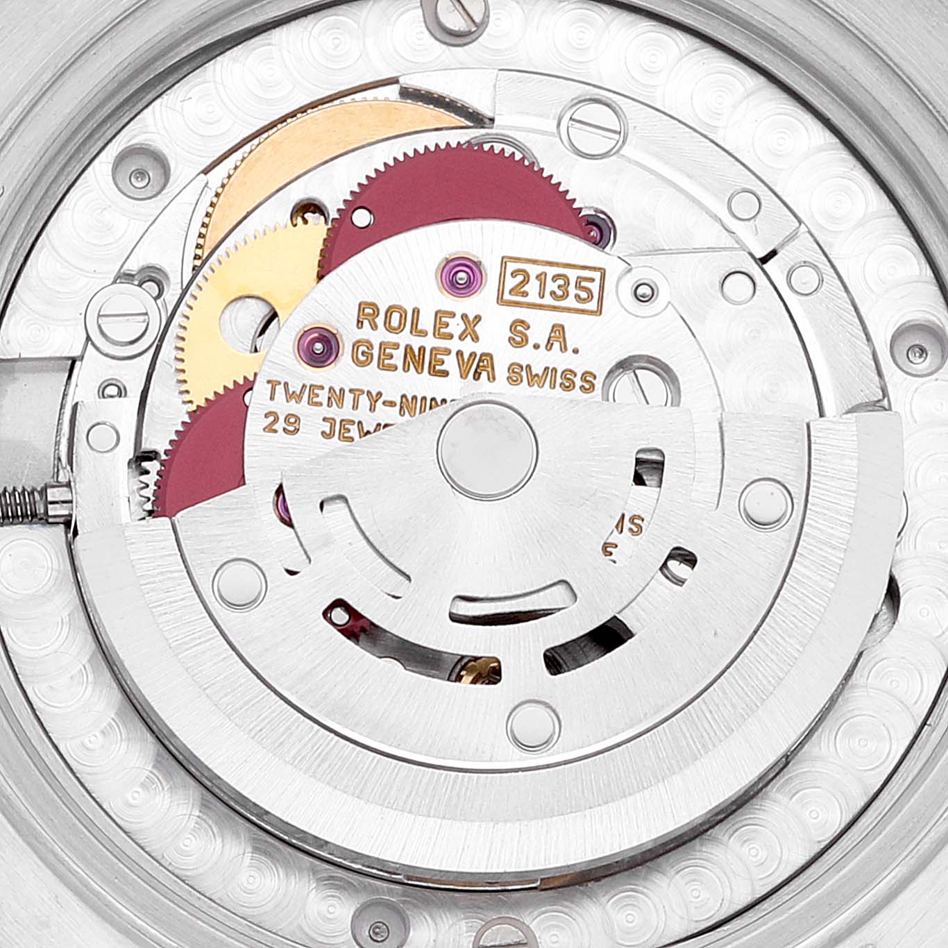 This is an inside view of the Rolex Mid-Size 68274 Women's Stainless Steel Mother of Pearl Dial 68274 Women's Stainless Steel Mother of Pearl Dial model showing the movement mechanism and gears.