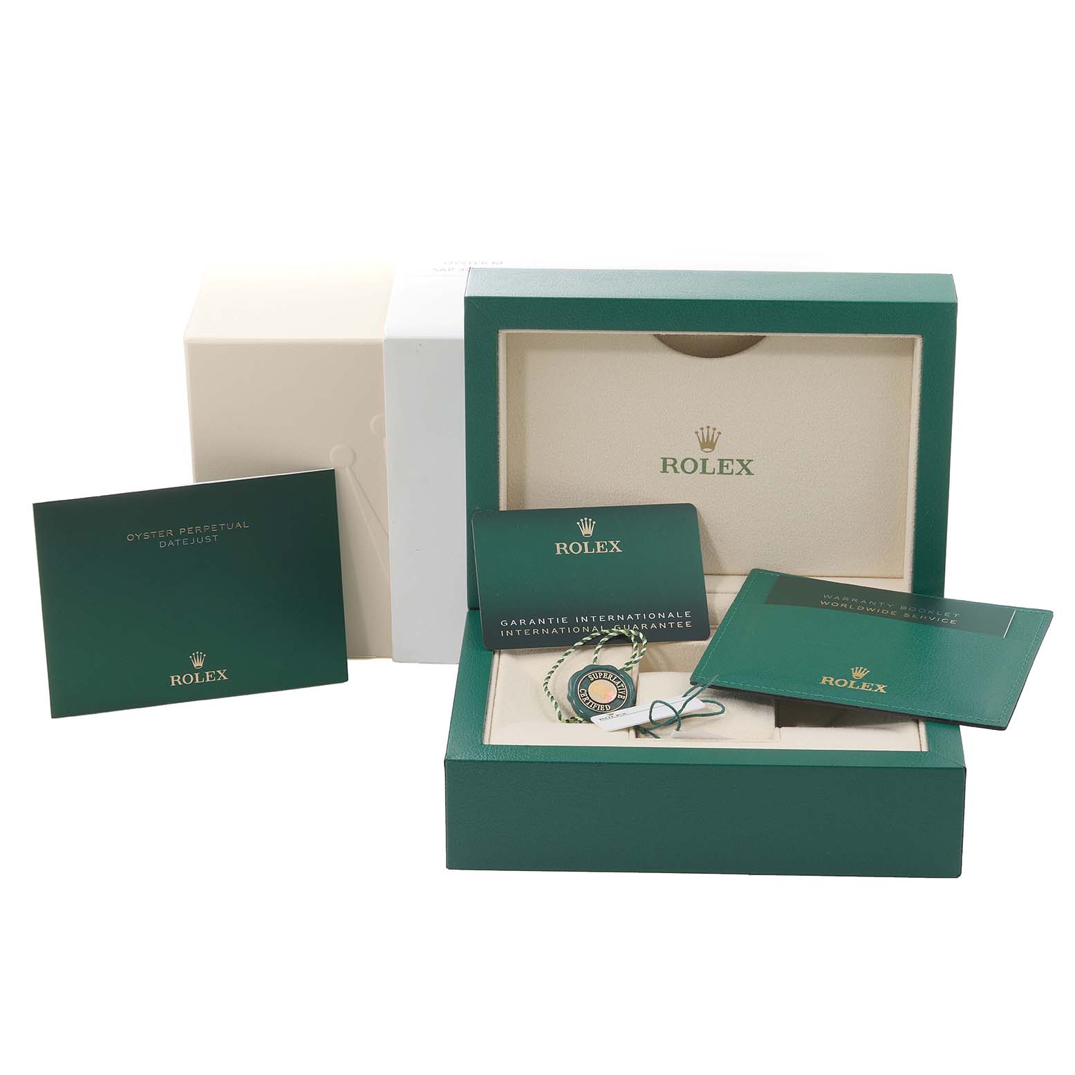 The image shows packaging and accessories for a Rolex Oyster Perpetual Datejust Mid-Size, including a box, manuals, and tags.