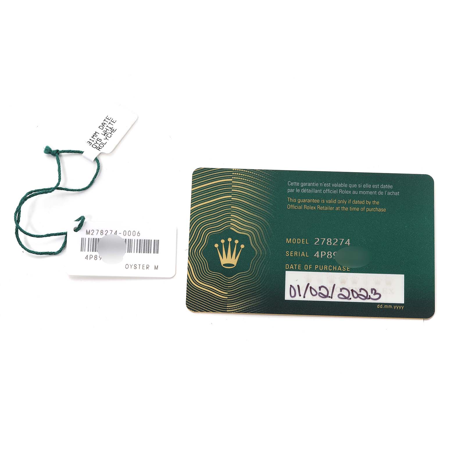 The image shows a Rolex Mid-Size 278274 Women's Stainless Steel Mother of Pearl Dial model warranty card and hang tag, displaying model and serial numbers.