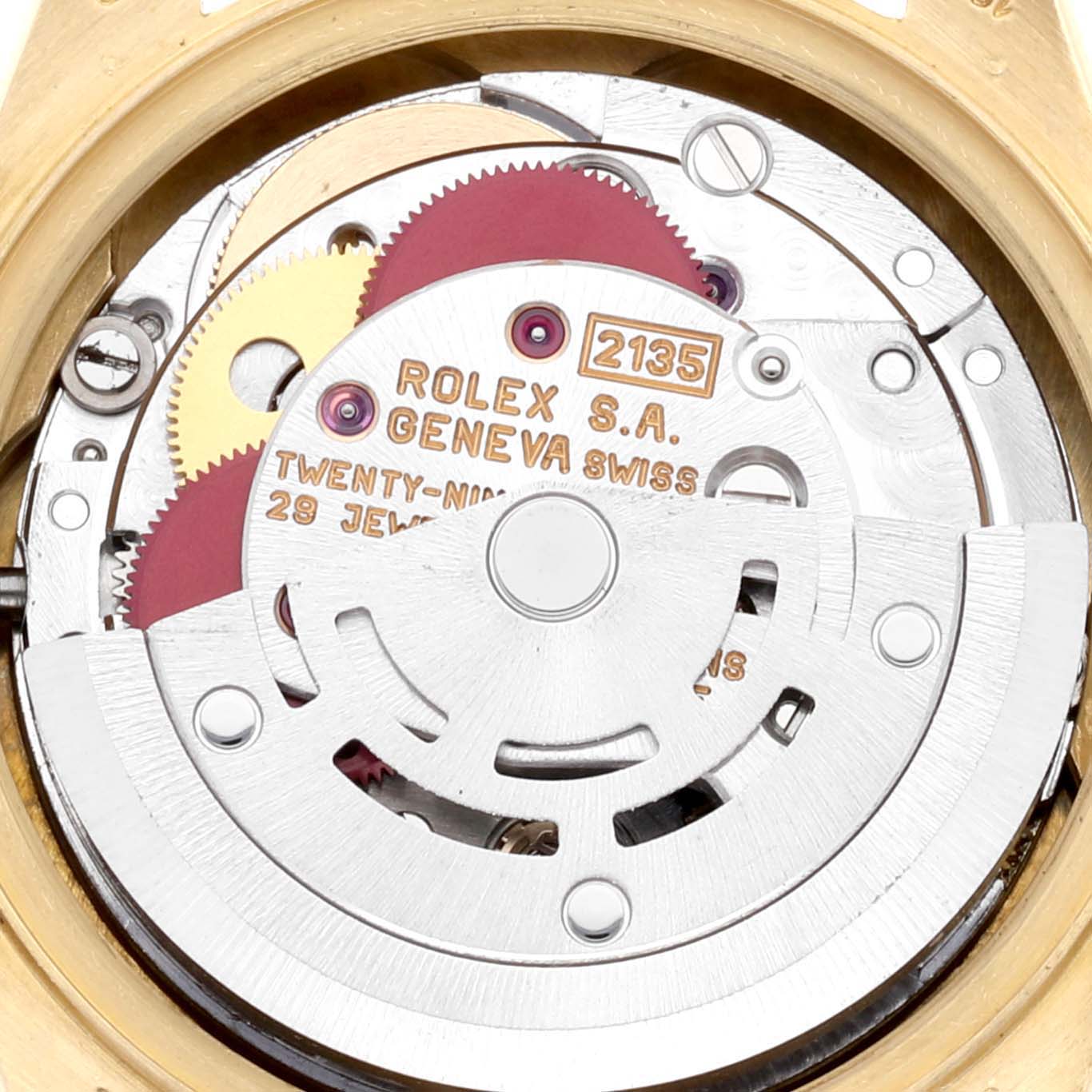 The image shows the internal movement mechanism of a Rolex President 69158 Women
s Yellow Gold Champagne Dial 69158 Women
s Yellow Gold Champagne Dial model, specifically featuring gears and the rotor.