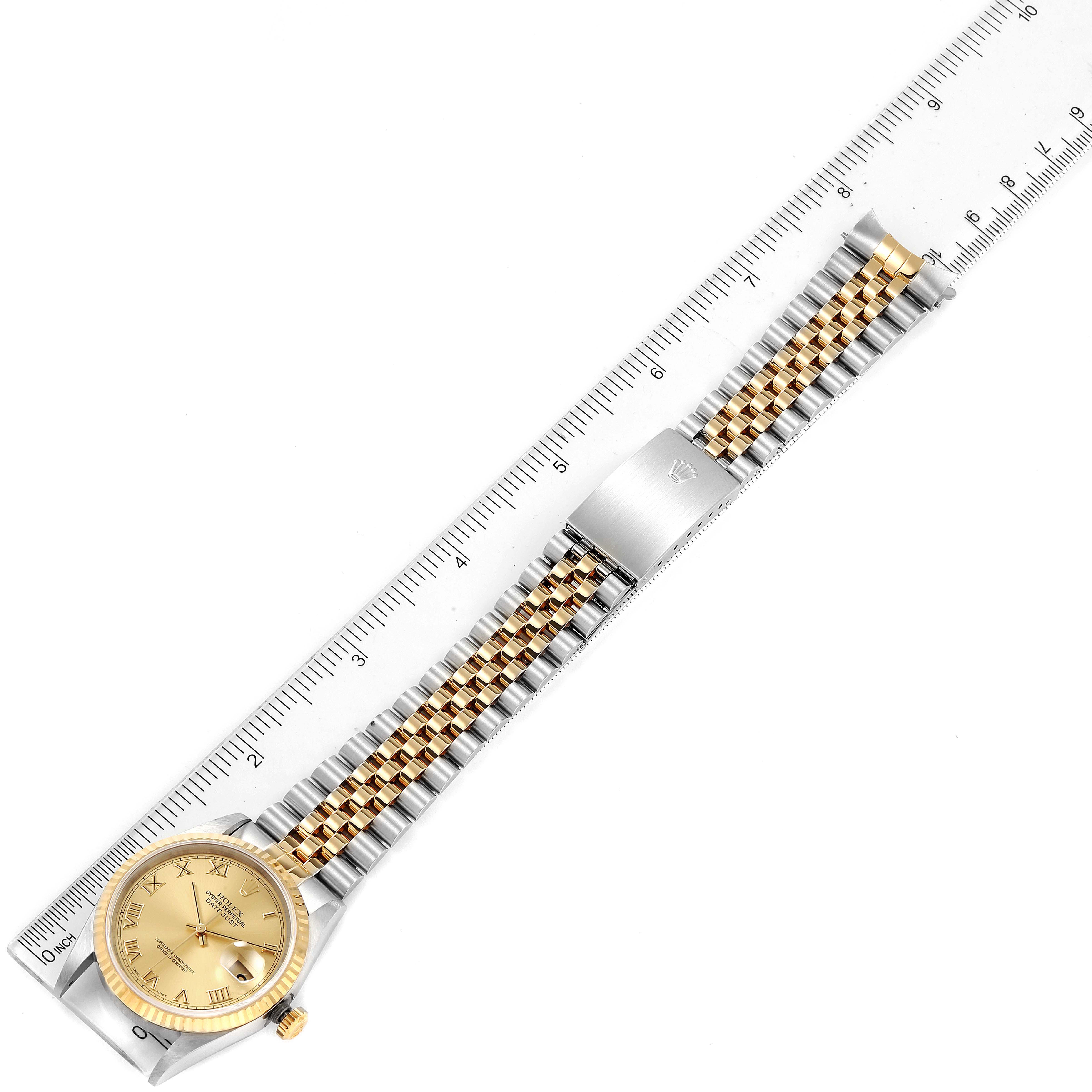 The image shows an overhead view of a Rolex Datejust 16233 Men's Steel and Gold (two tone) Champagne Dial 16233 Men's Steel and Gold (two tone) Champagne Dial watch, displaying its face, band, and clasp.