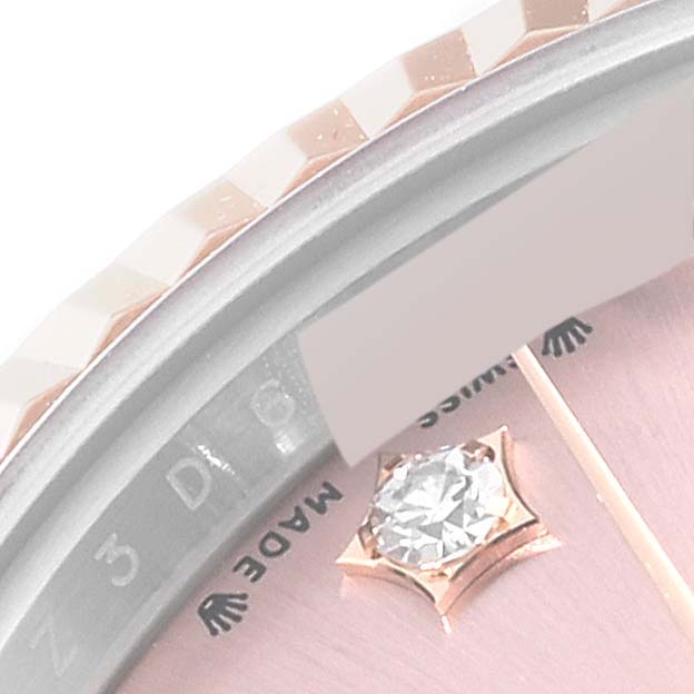 The image shows a close-up of the bezel and part of the dial with a diamond marker on a Rolex Datejust 279171 Women's Stainless Steel Pink Dial 279171 Women's Stainless Steel Pink Dial watch.