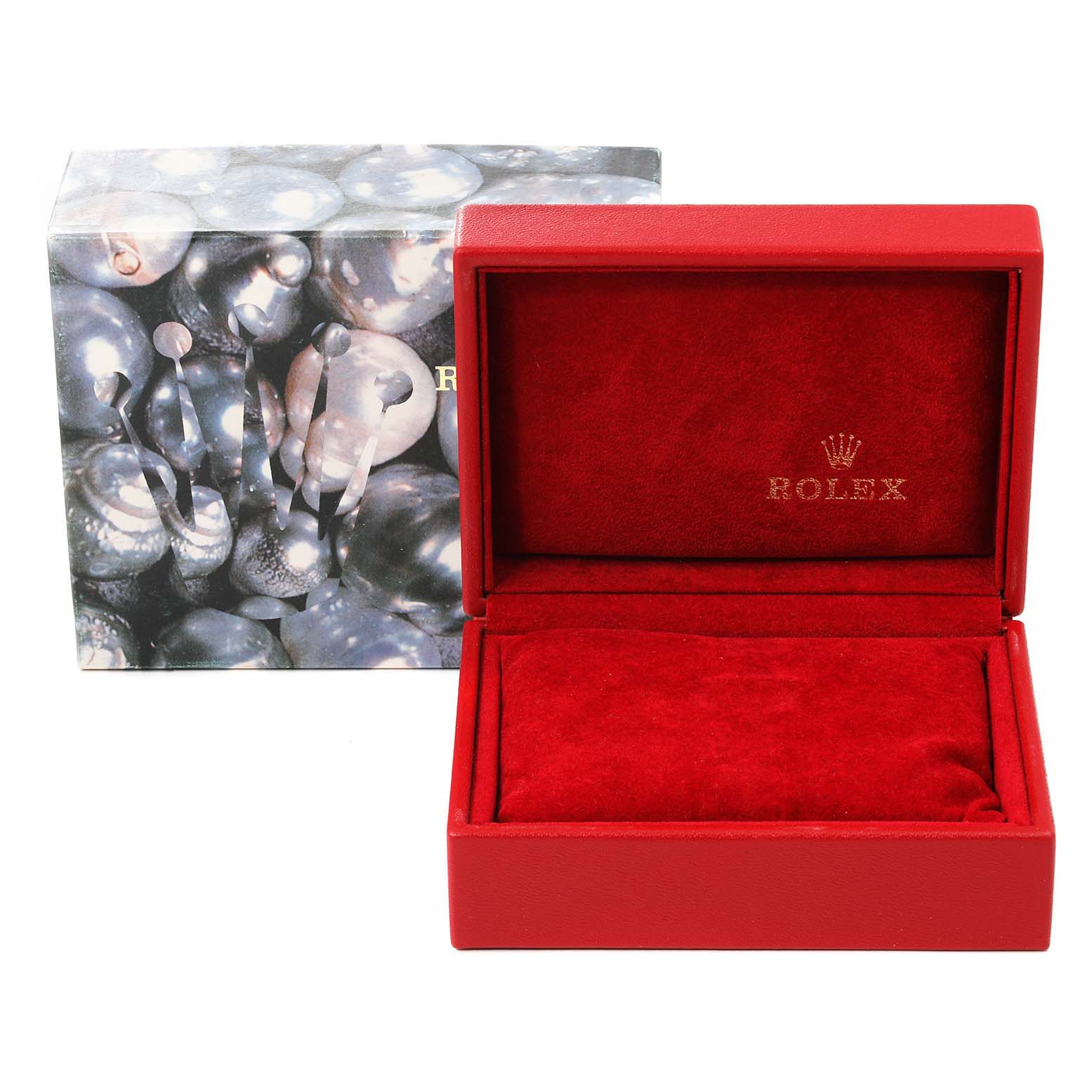 The image shows a red Rolex Datejust 79174 Women
s Stainless Steel Blue Dial 79174 Women
s Stainless Steel Blue Dial watch box with the lid open, revealing a matching red velvet interior.
