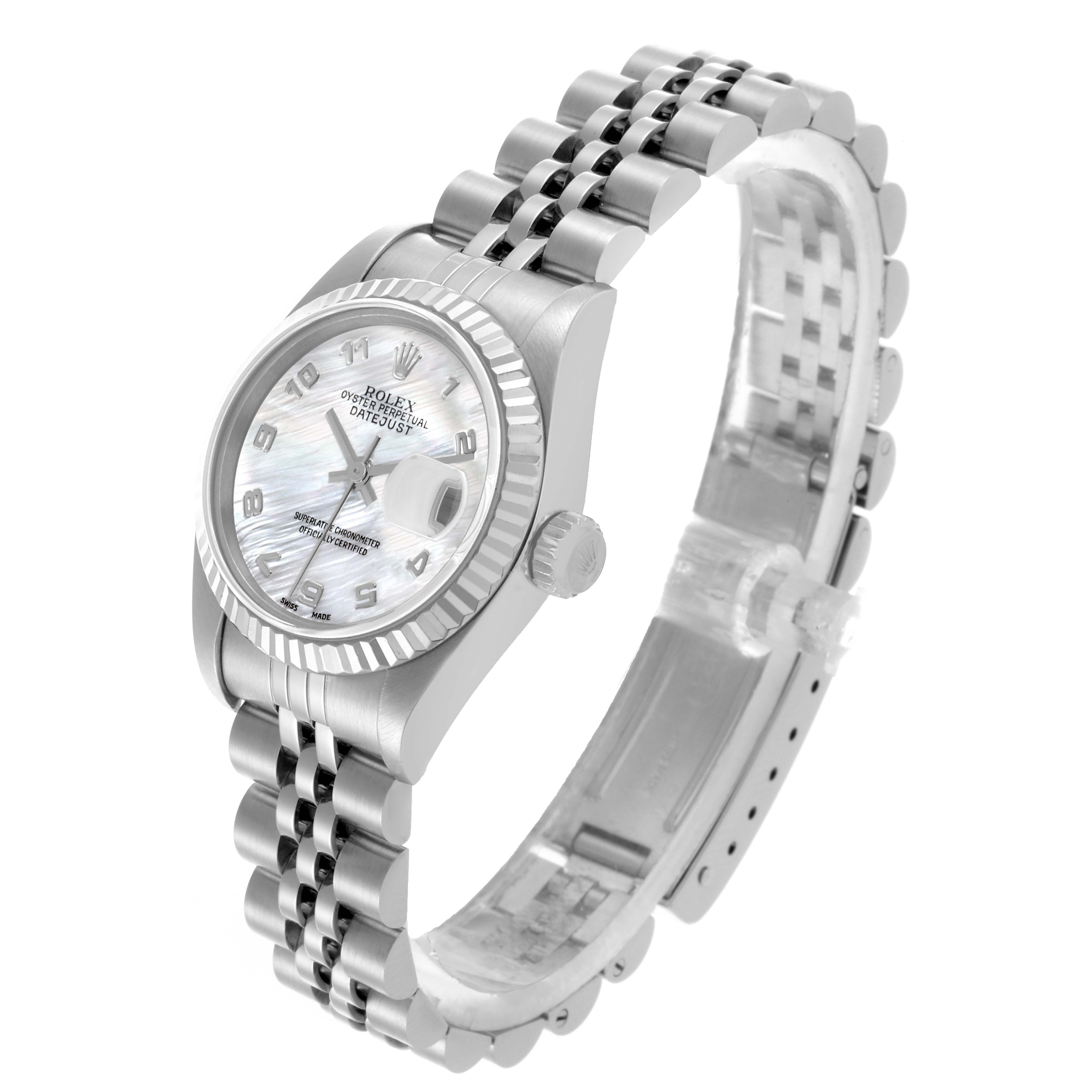 The Rolex Datejust 79174 Women's Stainless Steel Mother of Pearl Dial 79174 Women's Stainless Steel Mother of Pearl Dial watch is shown from an oblique angle highlighting the dial, bezel, and Jubilee bracelet.