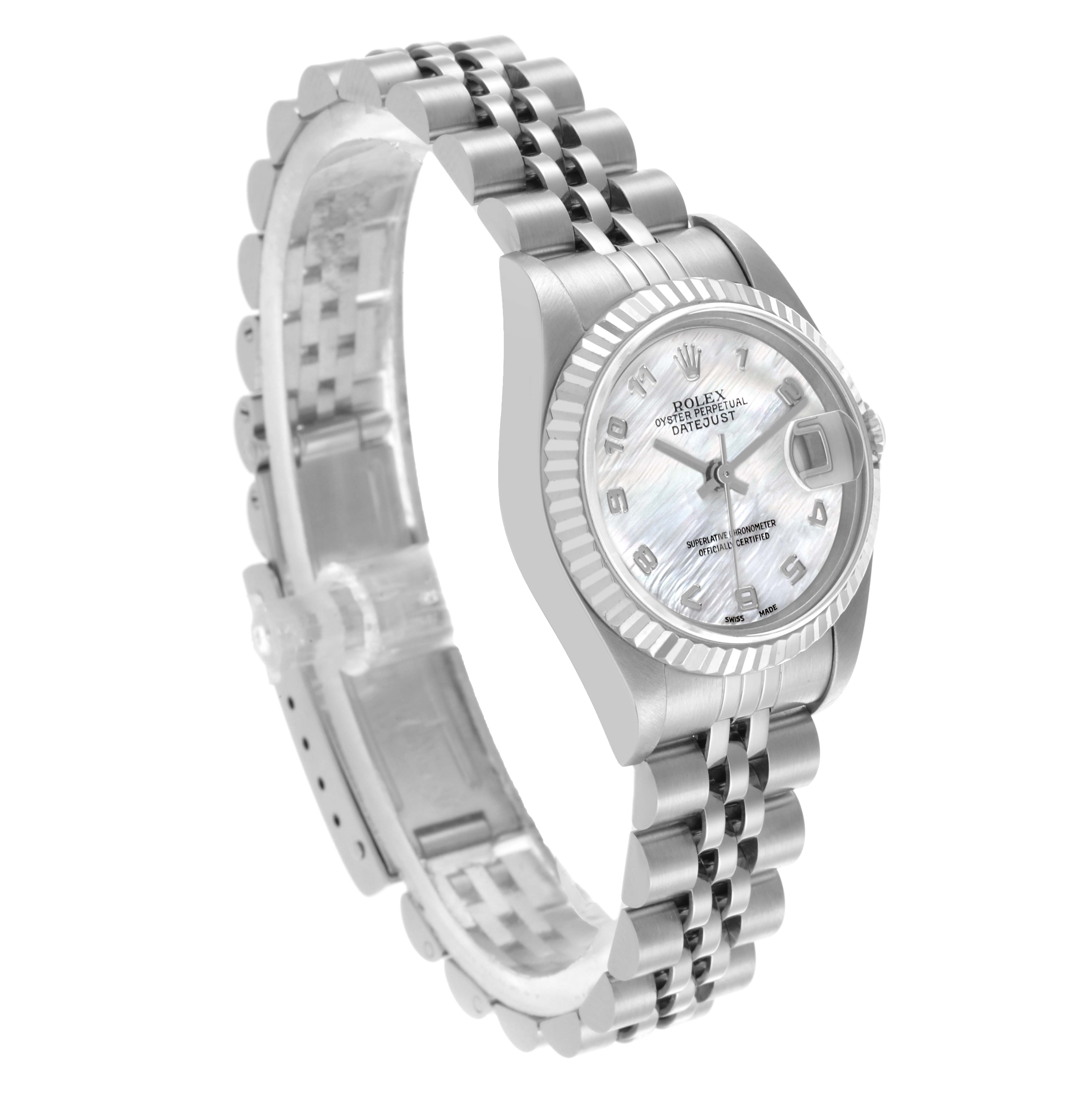 The Rolex Datejust 79174 Women's Stainless Steel Mother of Pearl Dial 79174 Women's Stainless Steel Mother of Pearl Dial watch is shown at a three-quarter angle, displaying its face, bezel, and bracelet.
