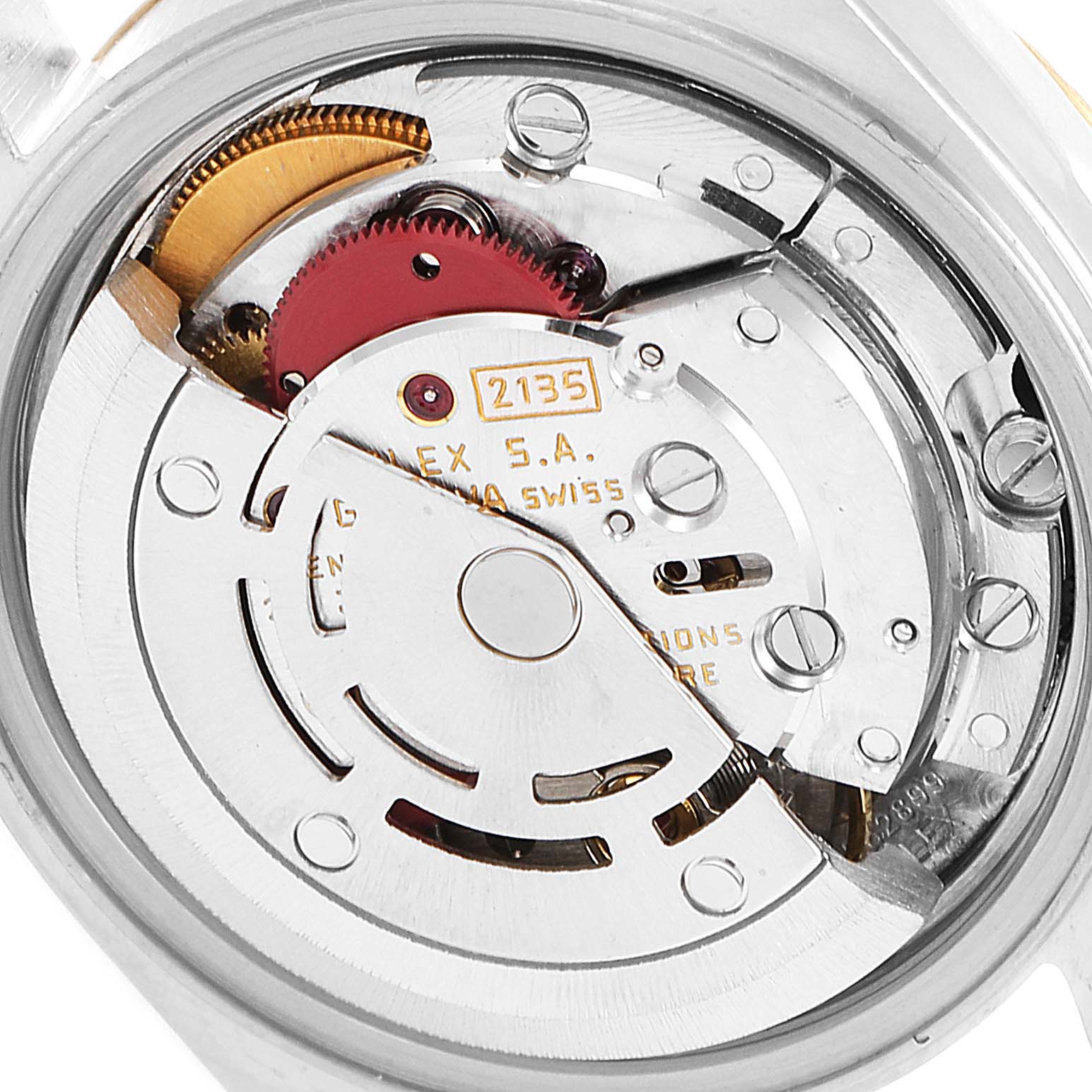 This image shows the internal movement and rotor of a Rolex Datejust 69173 Women's Steel and Gold (two tone) Black Dial 69173 Women's Steel and Gold (two tone) Black Dial model watch from a back angle.