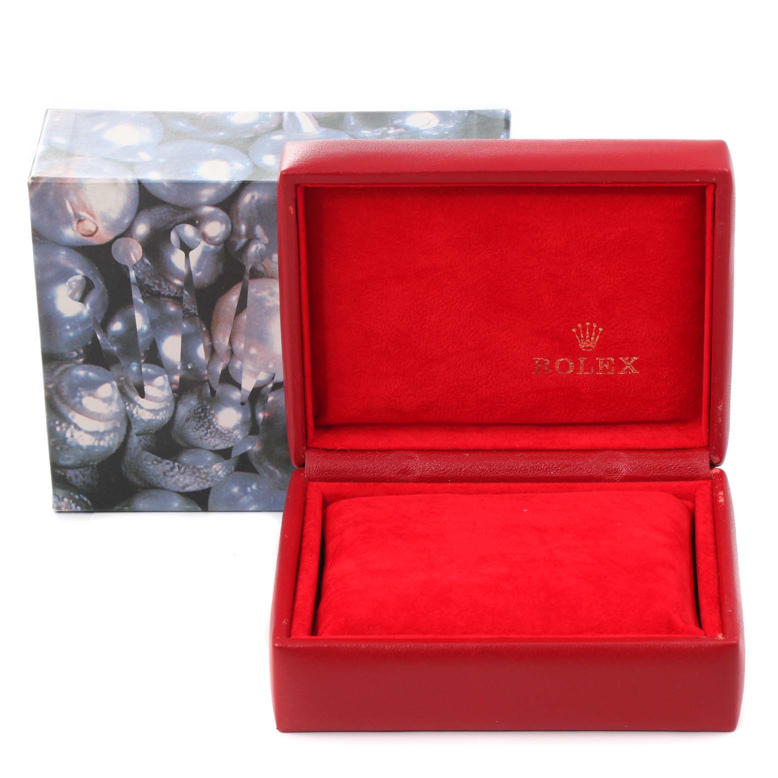 This image shows the open red velvet box for a Rolex Datejust 79173 Women's Steel and Gold (two tone) Blue Dial 79173 Women's Steel and Gold (two tone) Blue Dial watch, along with its outer decorative box.