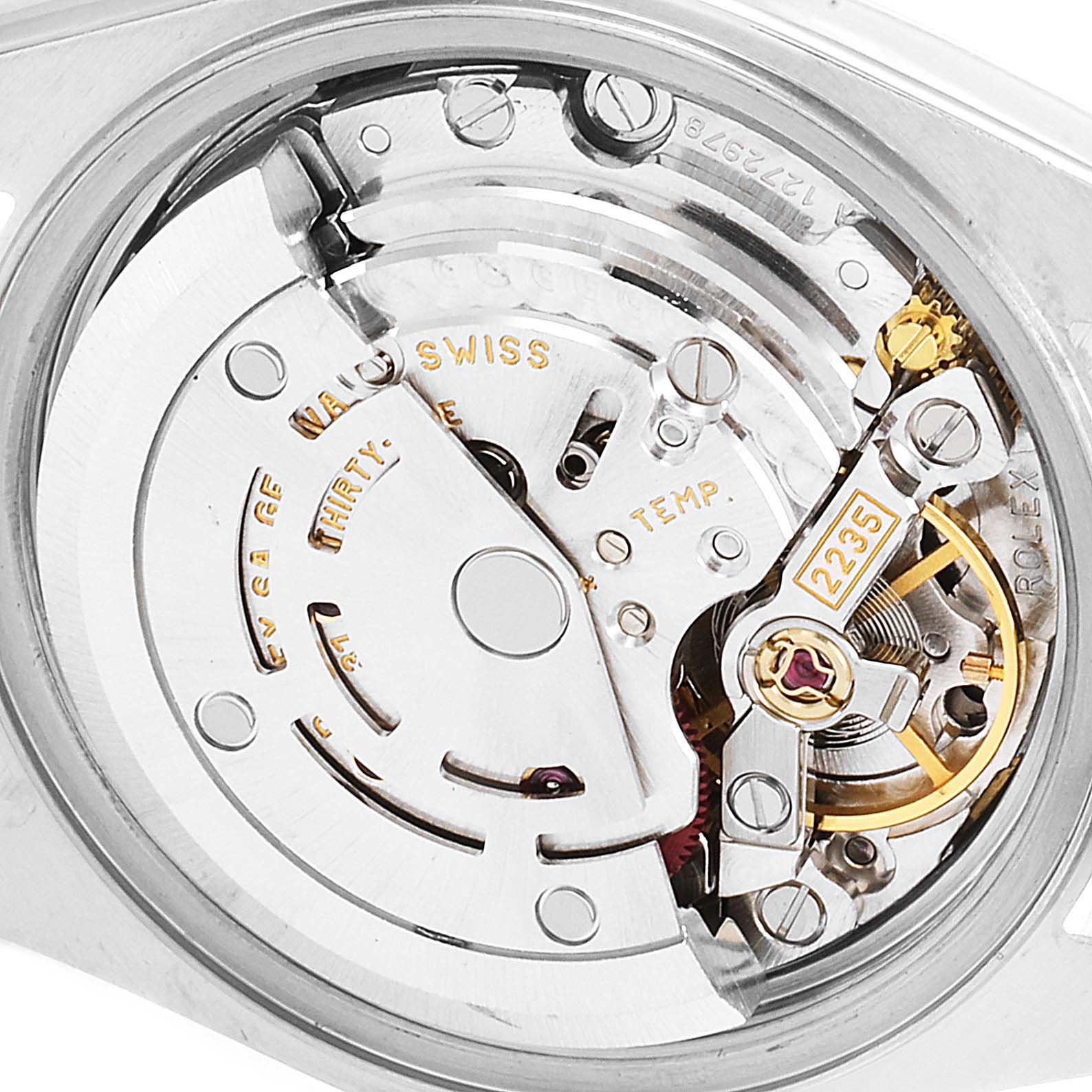 This image shows a close-up view of the internal movement of a Rolex Datejust 79173 Women's Steel and Gold (two tone) Blue Dial 79173 Women's Steel and Gold (two tone) Blue Dial watch.