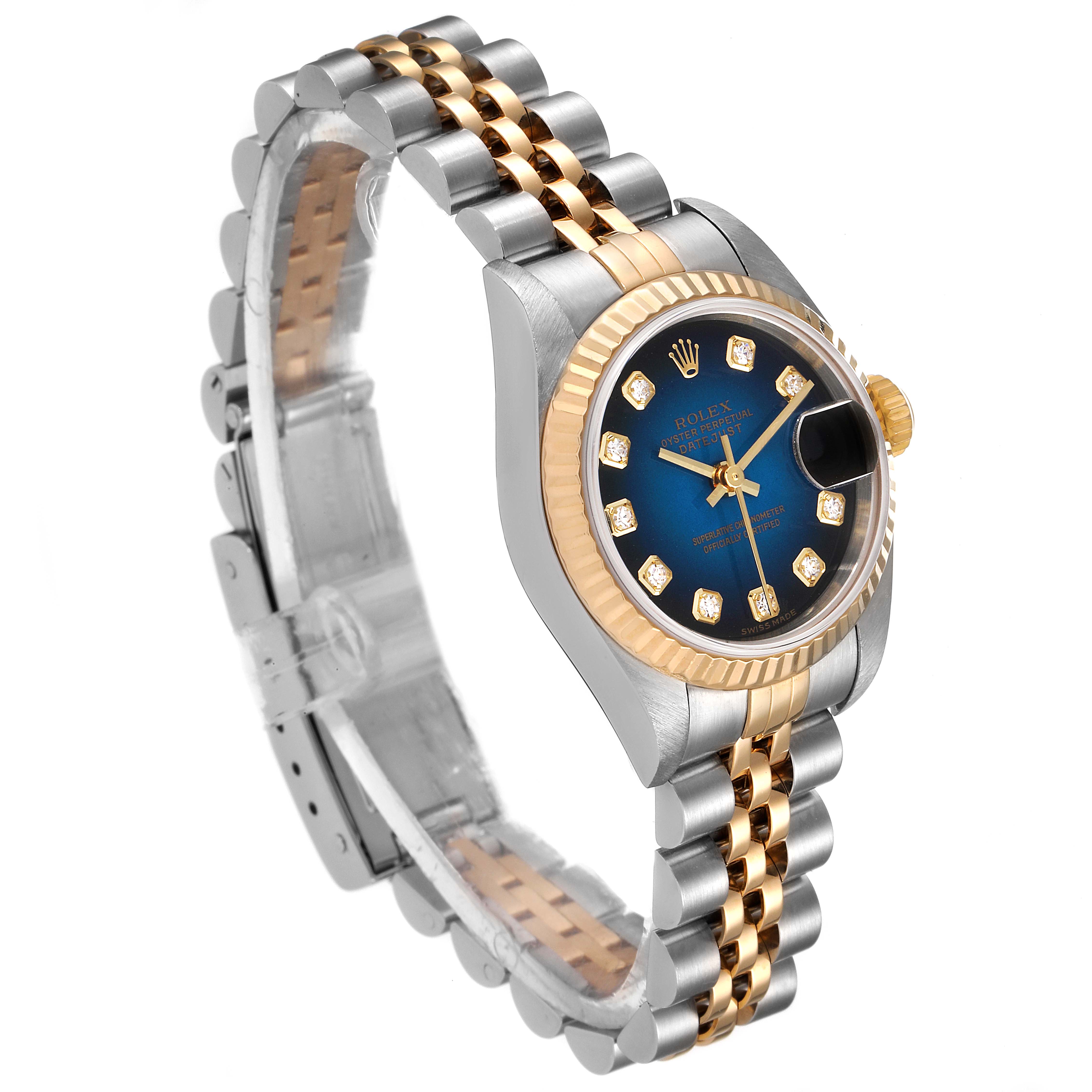 This image shows a Rolex Datejust 79173 Women's Steel and Gold (two tone) Blue Dial 79173 Women's Steel and Gold (two tone) Blue Dial watch angled to display the face, bracelet, bezel, and crown.