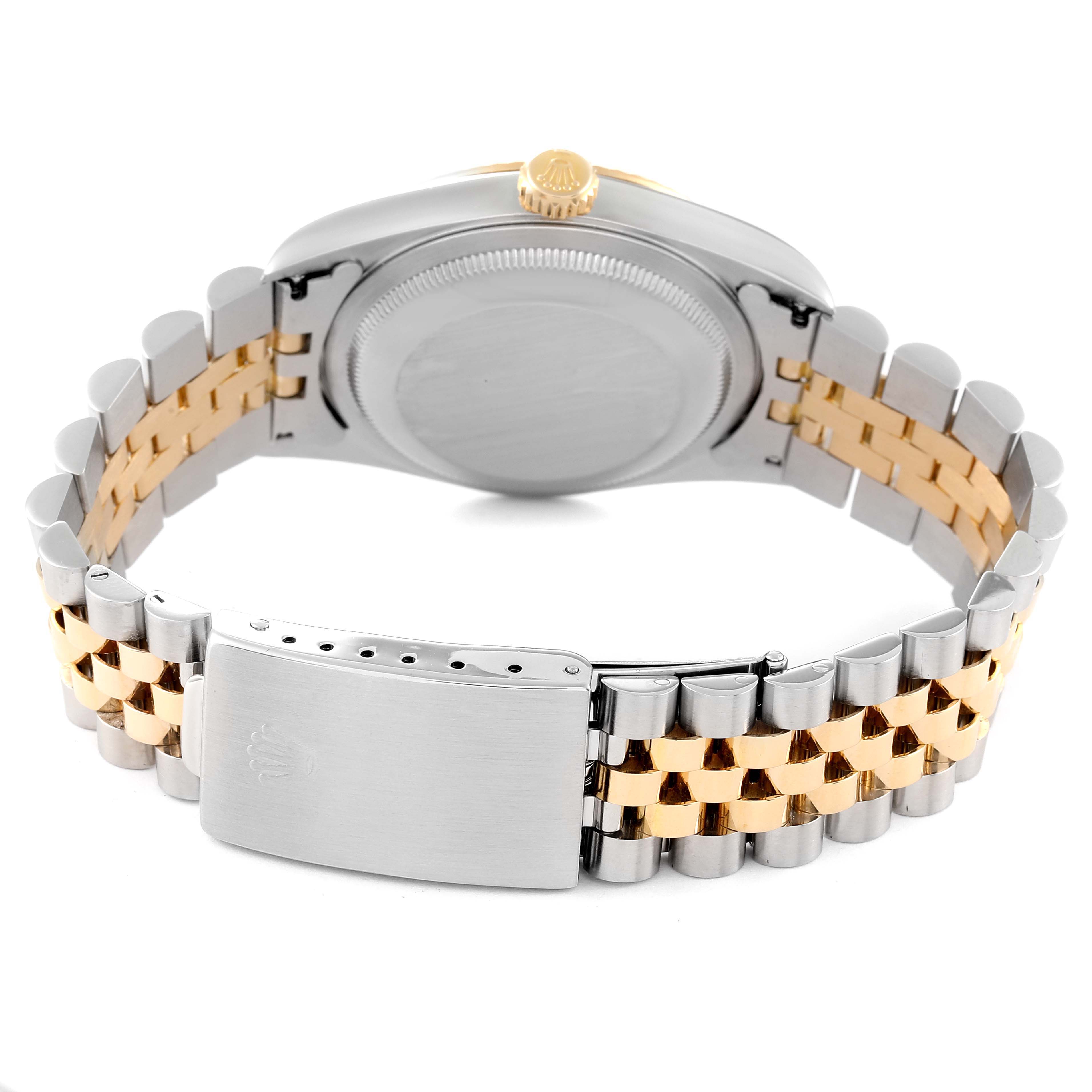 The image shows the back and clasp side of a Rolex Datejust 16233 Men's Steel and Gold (two tone) Champagne Dial 16233 Men's Steel and Gold (two tone) Champagne Dial watch with a two-tone metal strap.